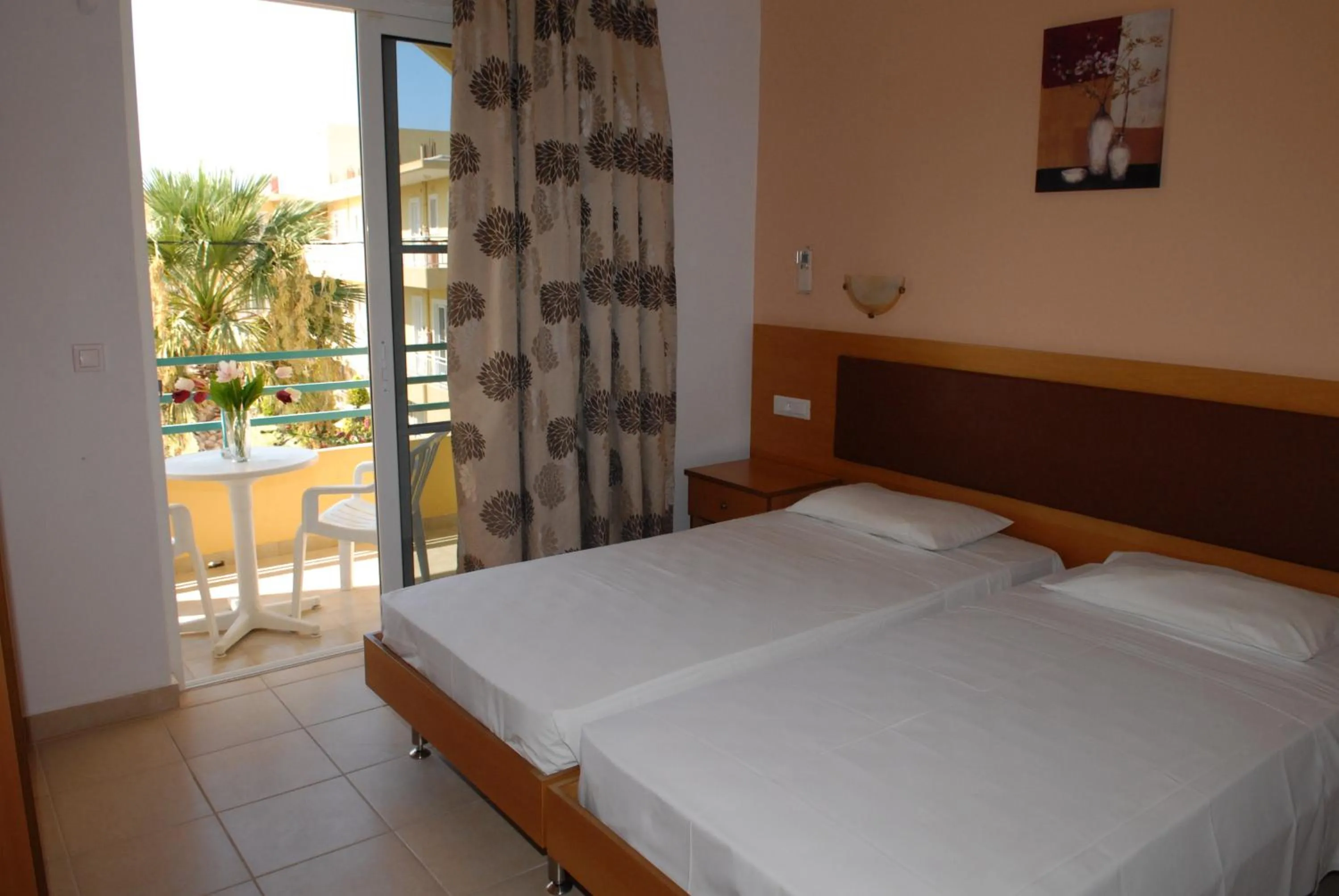 Bed in Barbie Hotel Apartments