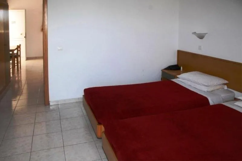 Bed in Barbie Hotel Apartments
