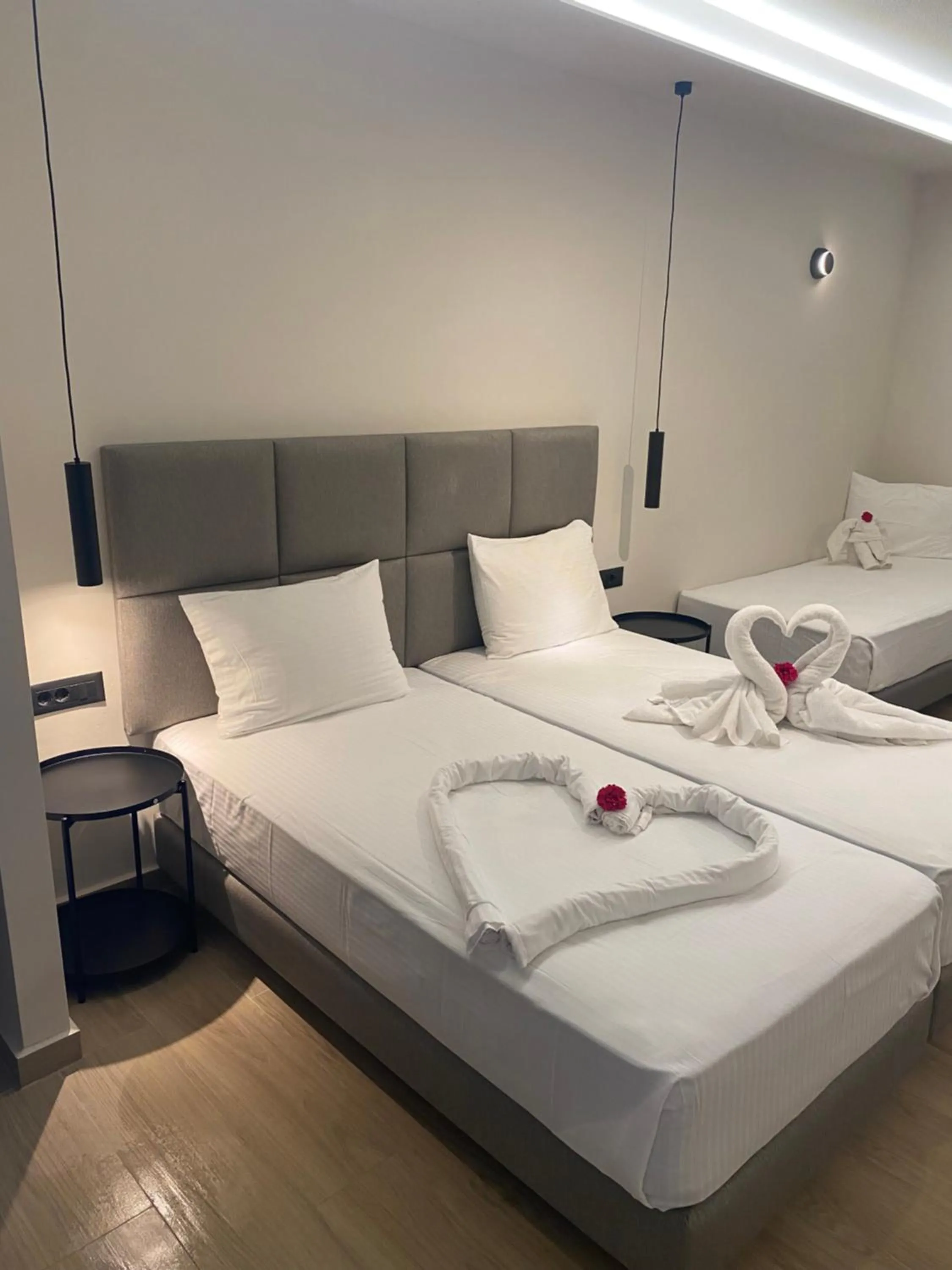 Bed in Barbie Hotel Apartments