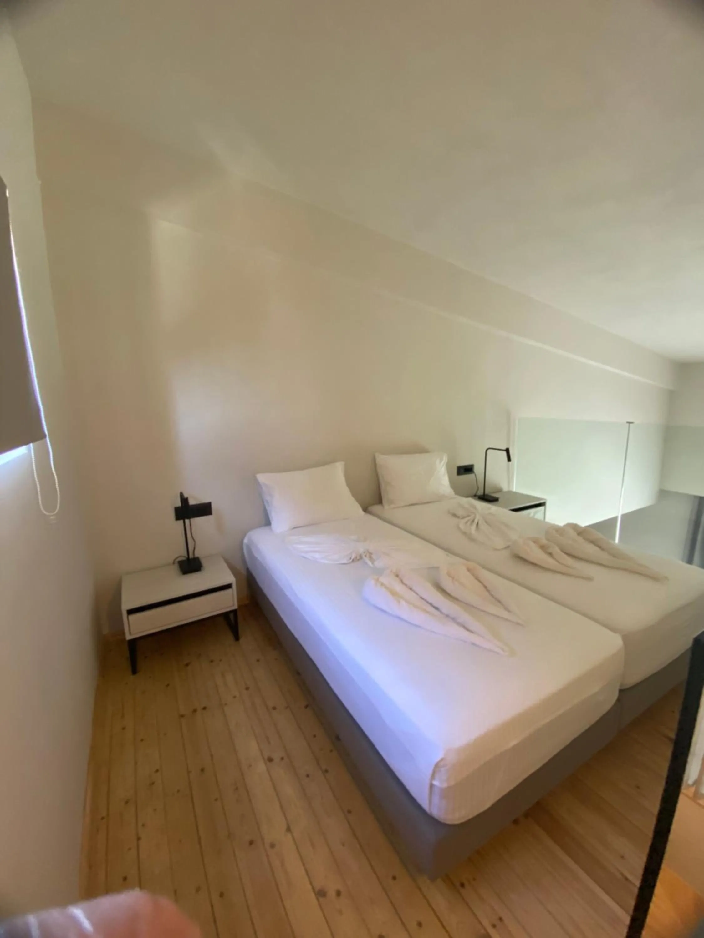 Bed in Barbie Hotel Apartments
