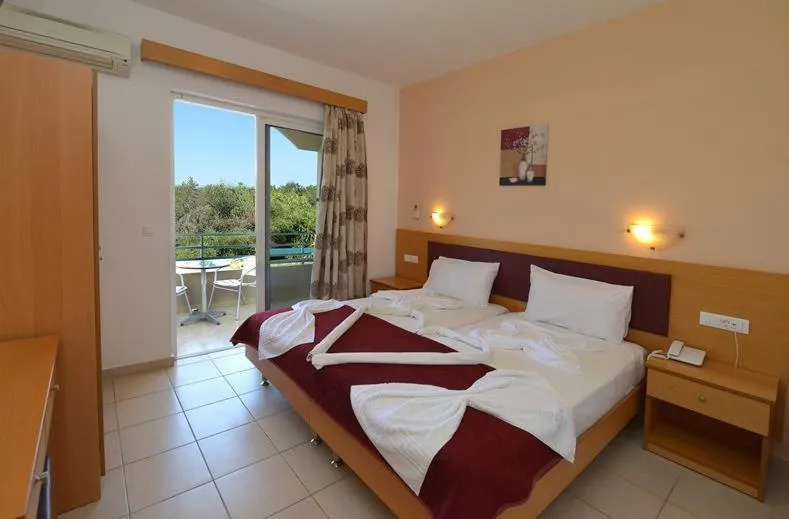 Bed in Barbie Hotel Apartments