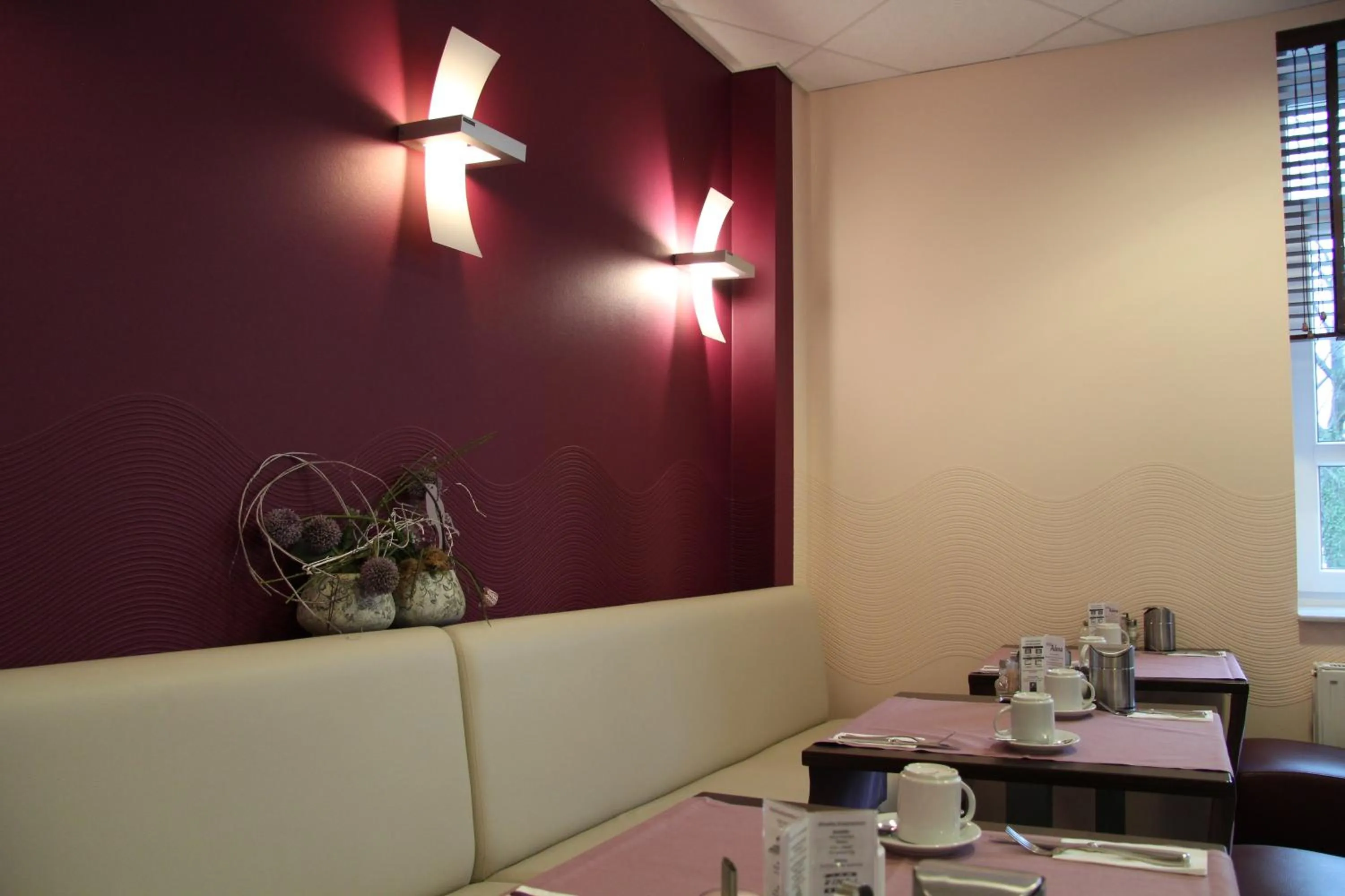 Dining area in Adena Hotel