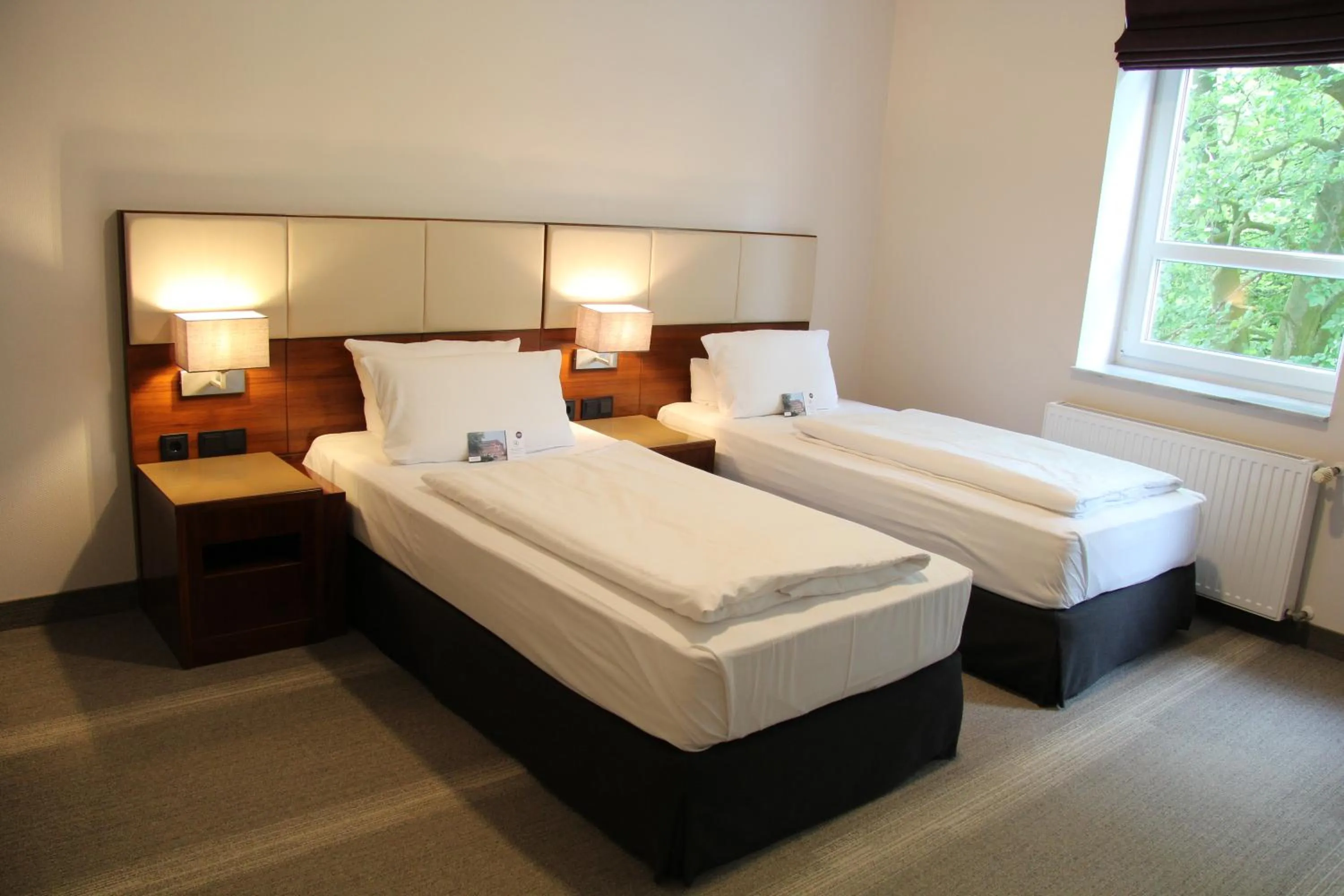 Photo of the whole room, Bed in Adena Hotel