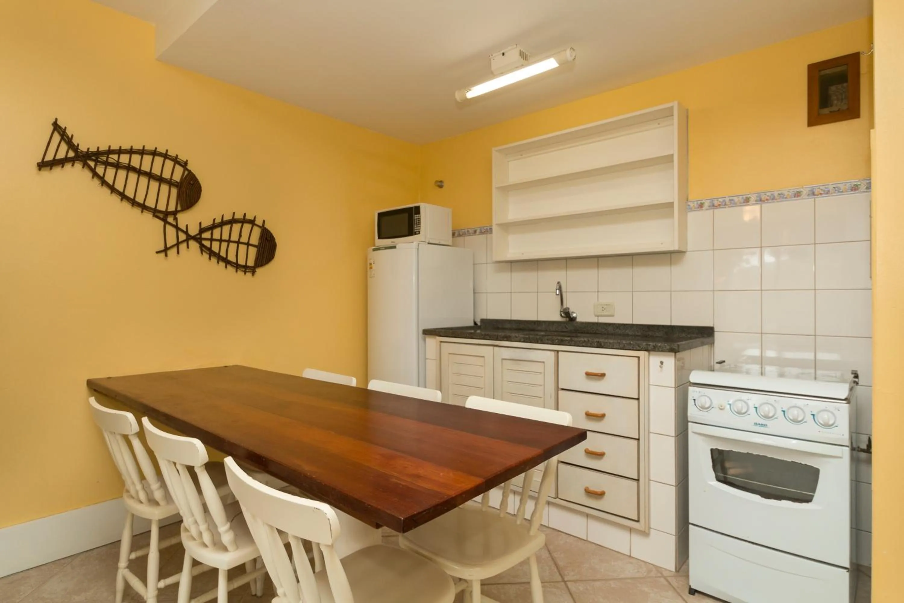 Kitchen or kitchenette in Pousada Vila do Bosque