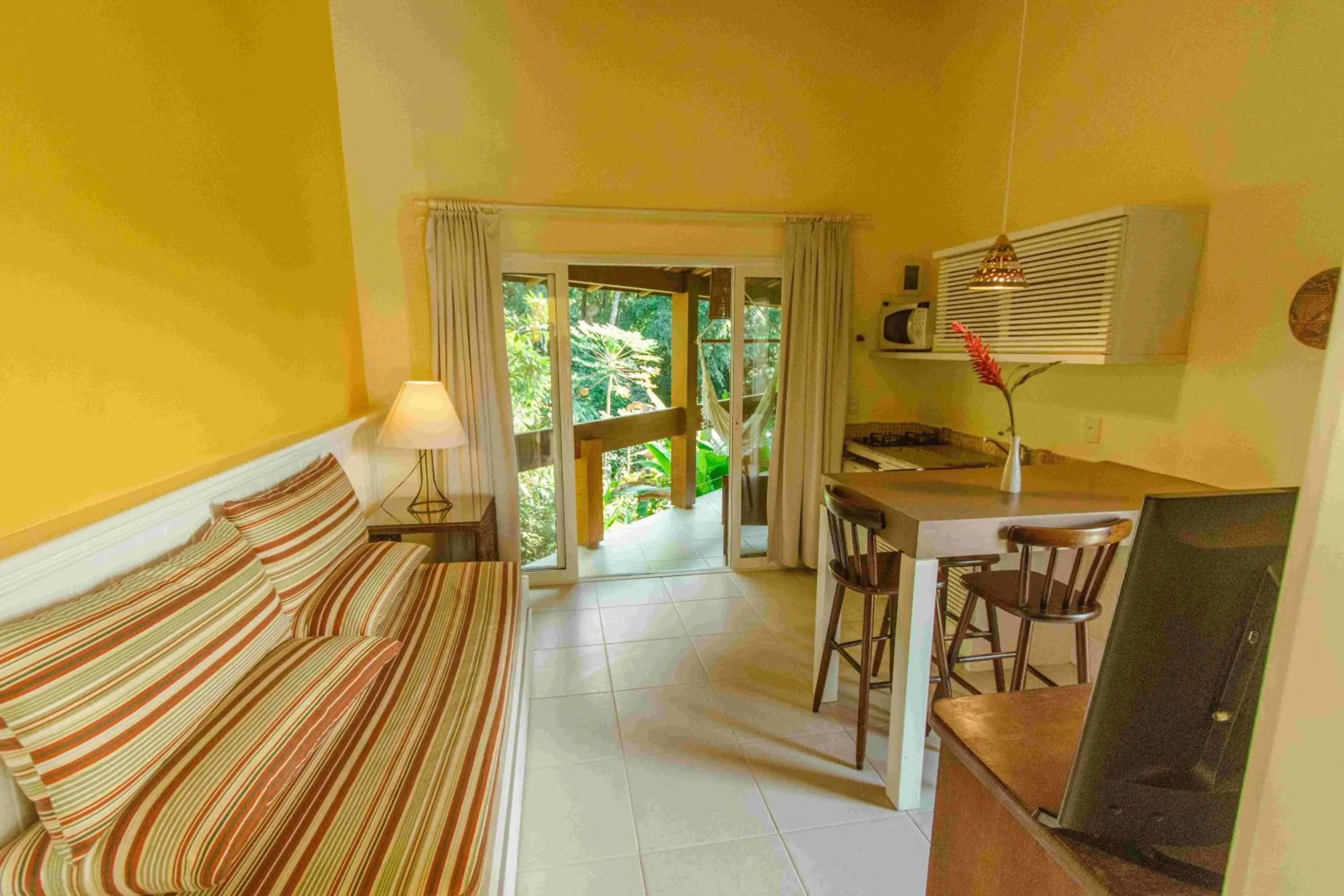 Living room, Bed in Pousada Vila do Bosque