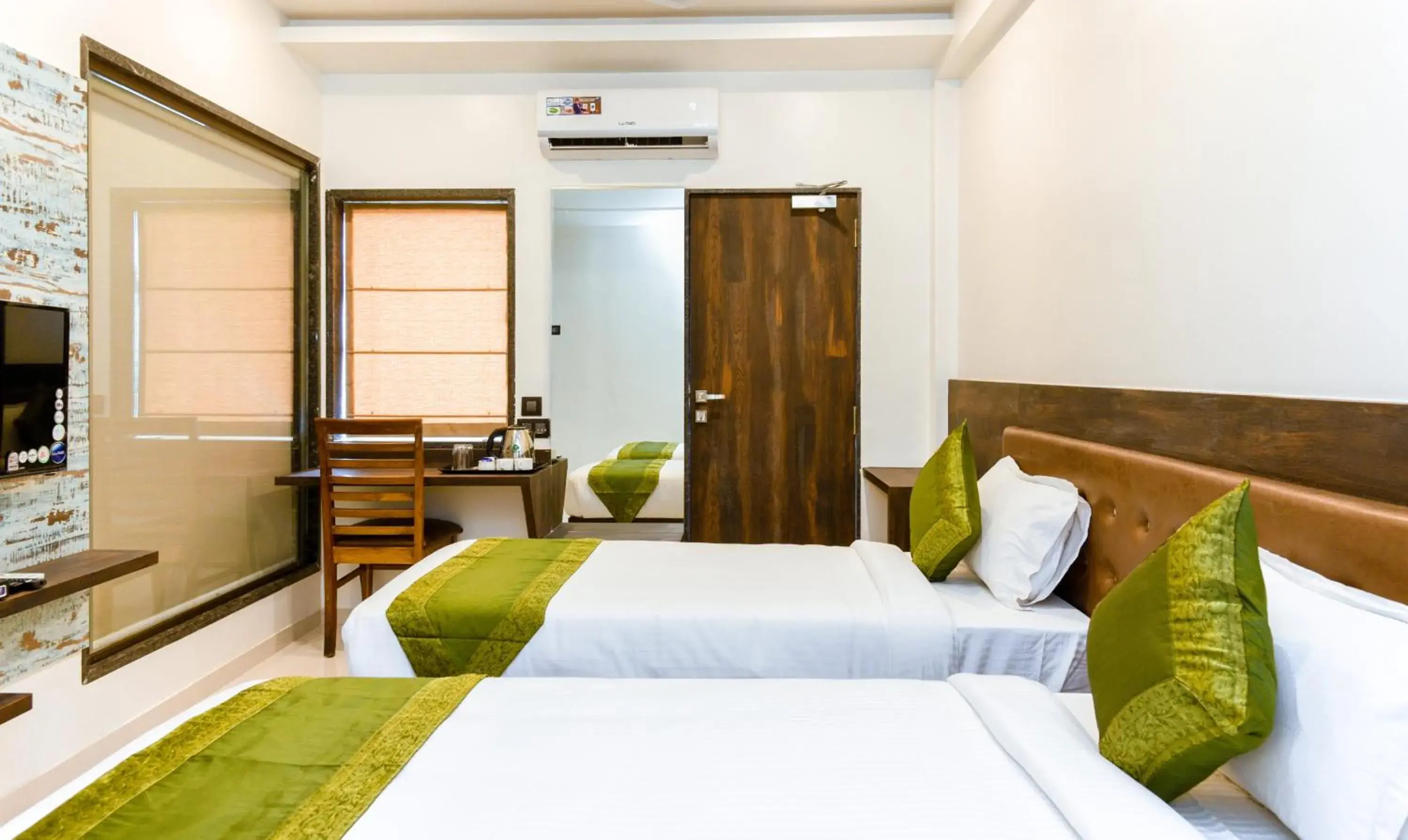 Bedroom, Bed in Treebo Malhaar Regency Bedroom, Bed in Treebo Malhaar Regency