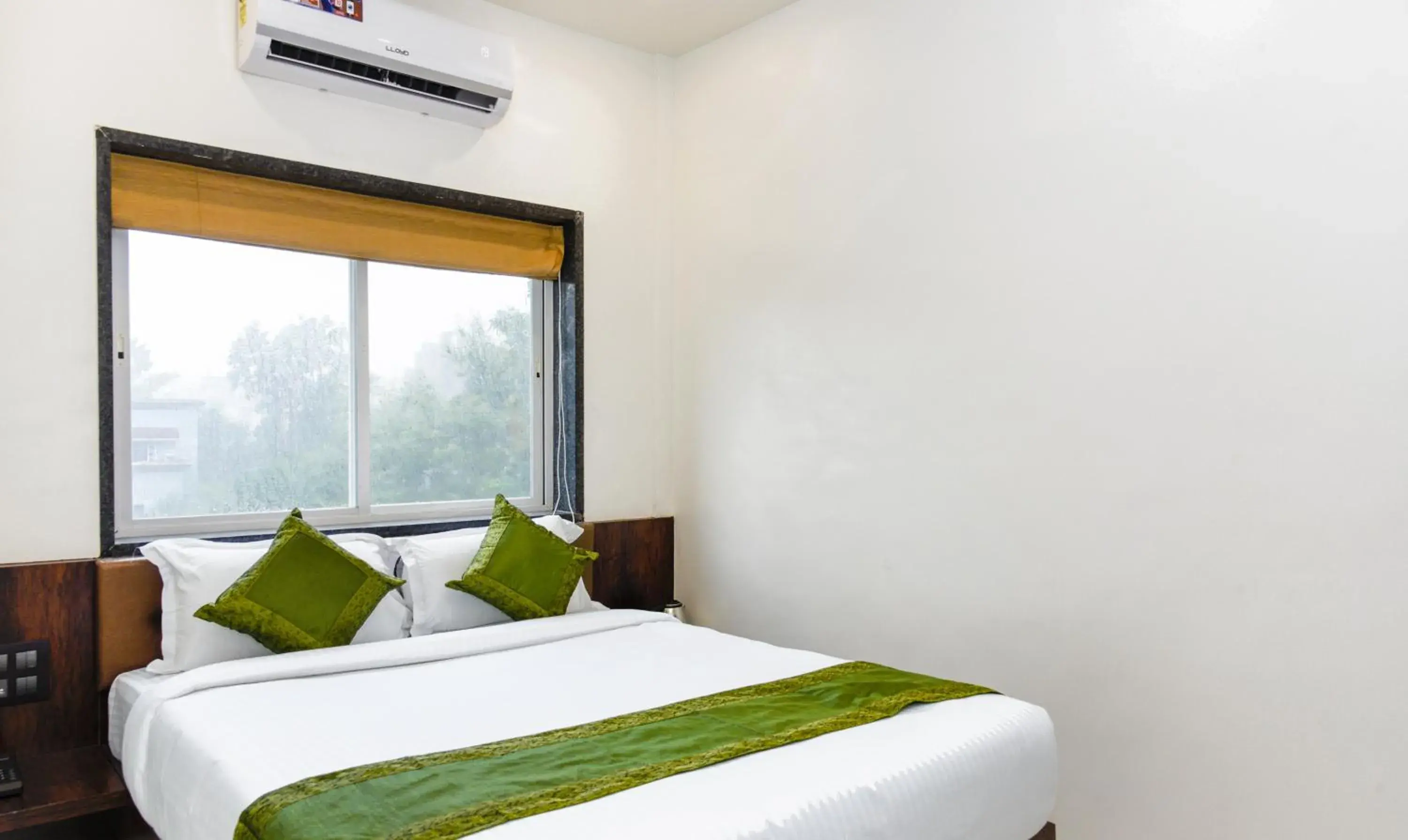 Bedroom, Bed in Treebo Malhaar Regency Bedroom, Bed in Treebo Malhaar Regency