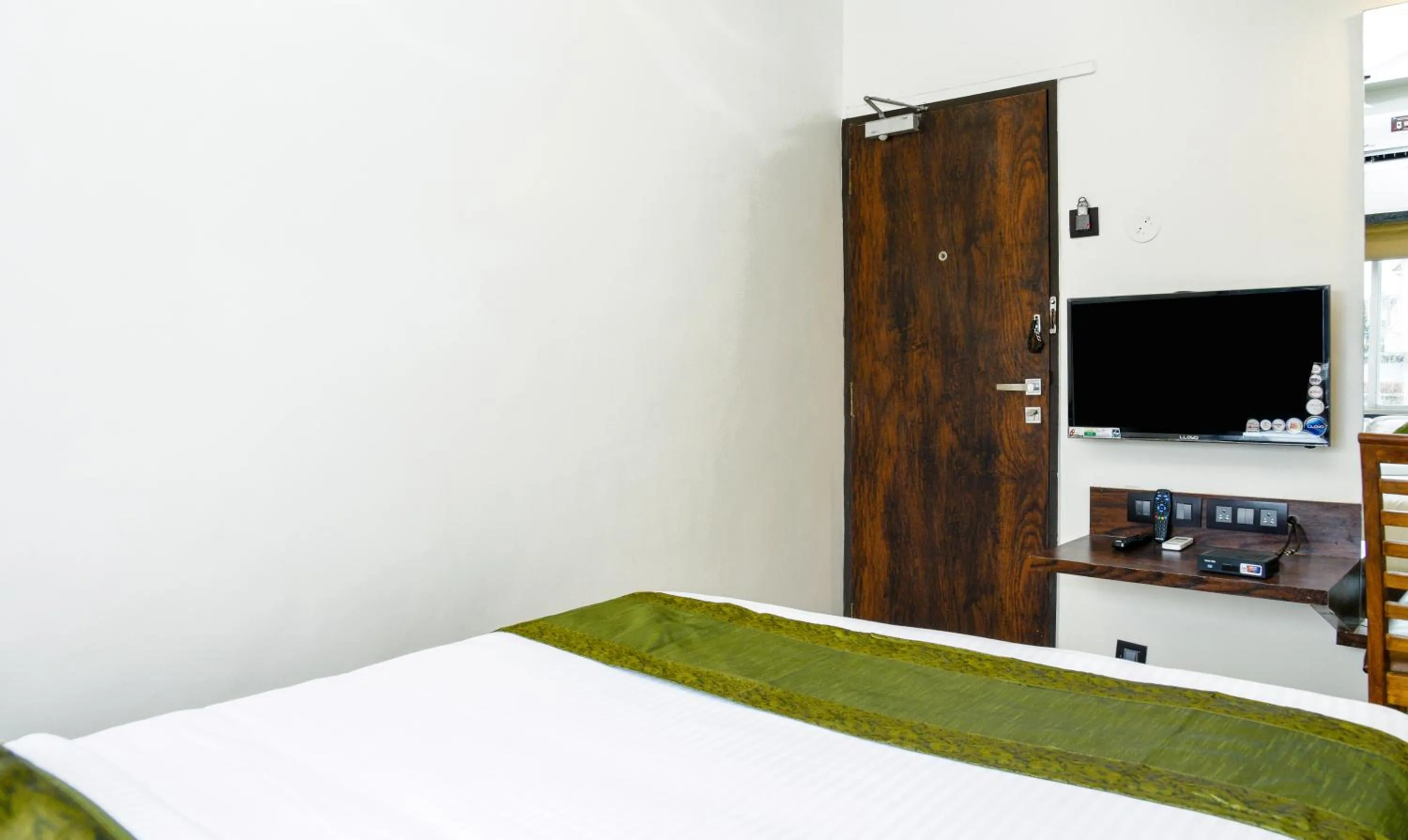 Bedroom, Bed in Treebo Malhaar Regency