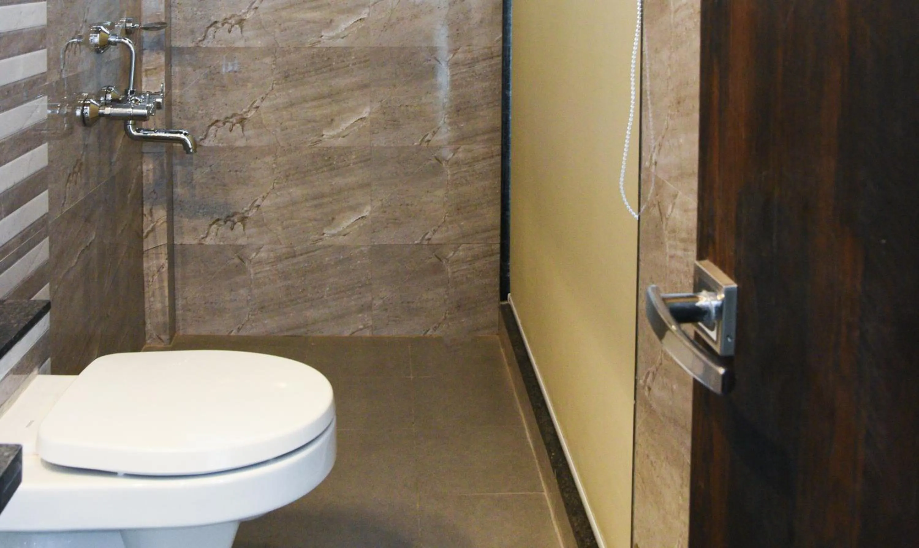 Bathroom in Treebo Malhaar Regency