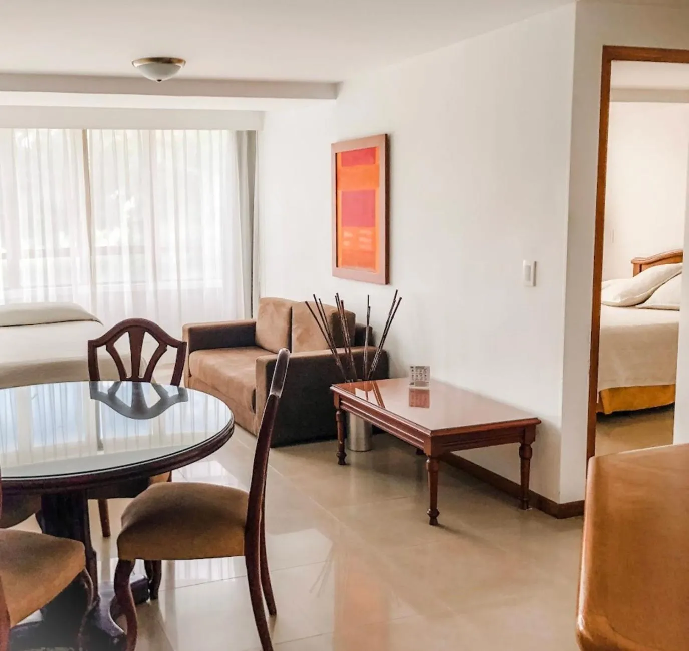 Living room, Bed in Portal del Rodeo ApartaHotel - Arkadia Mall