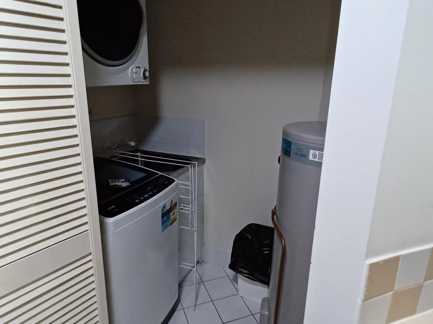 washing machine in Blue Waters Apartments