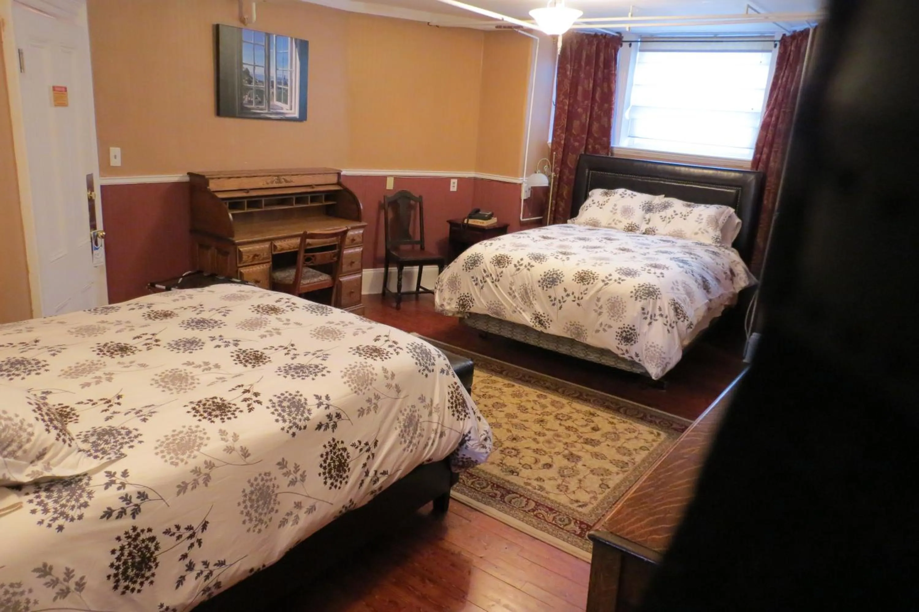 Bed in The Roses Heritage Inn