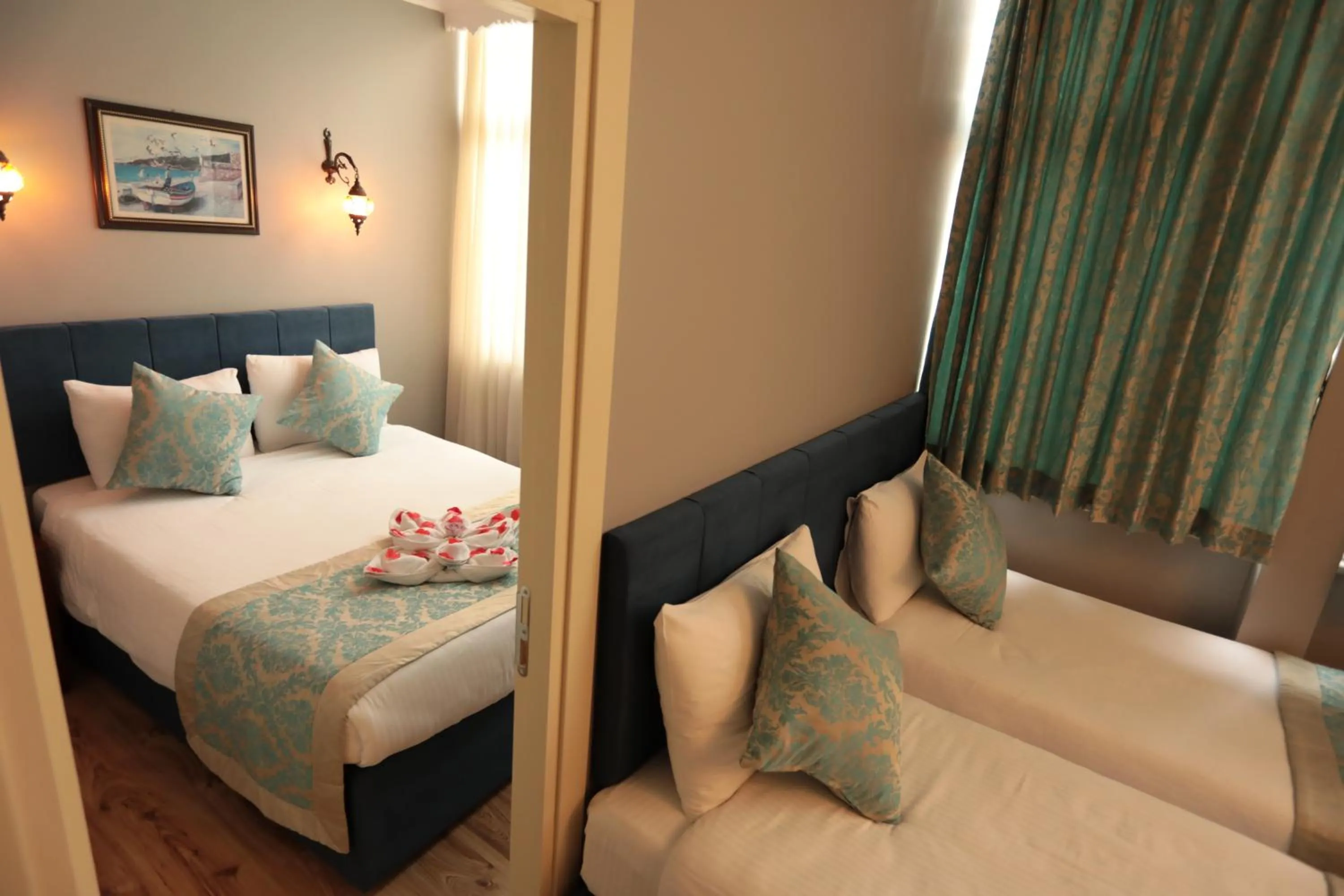 Bed in White Pearl Apart Hotel