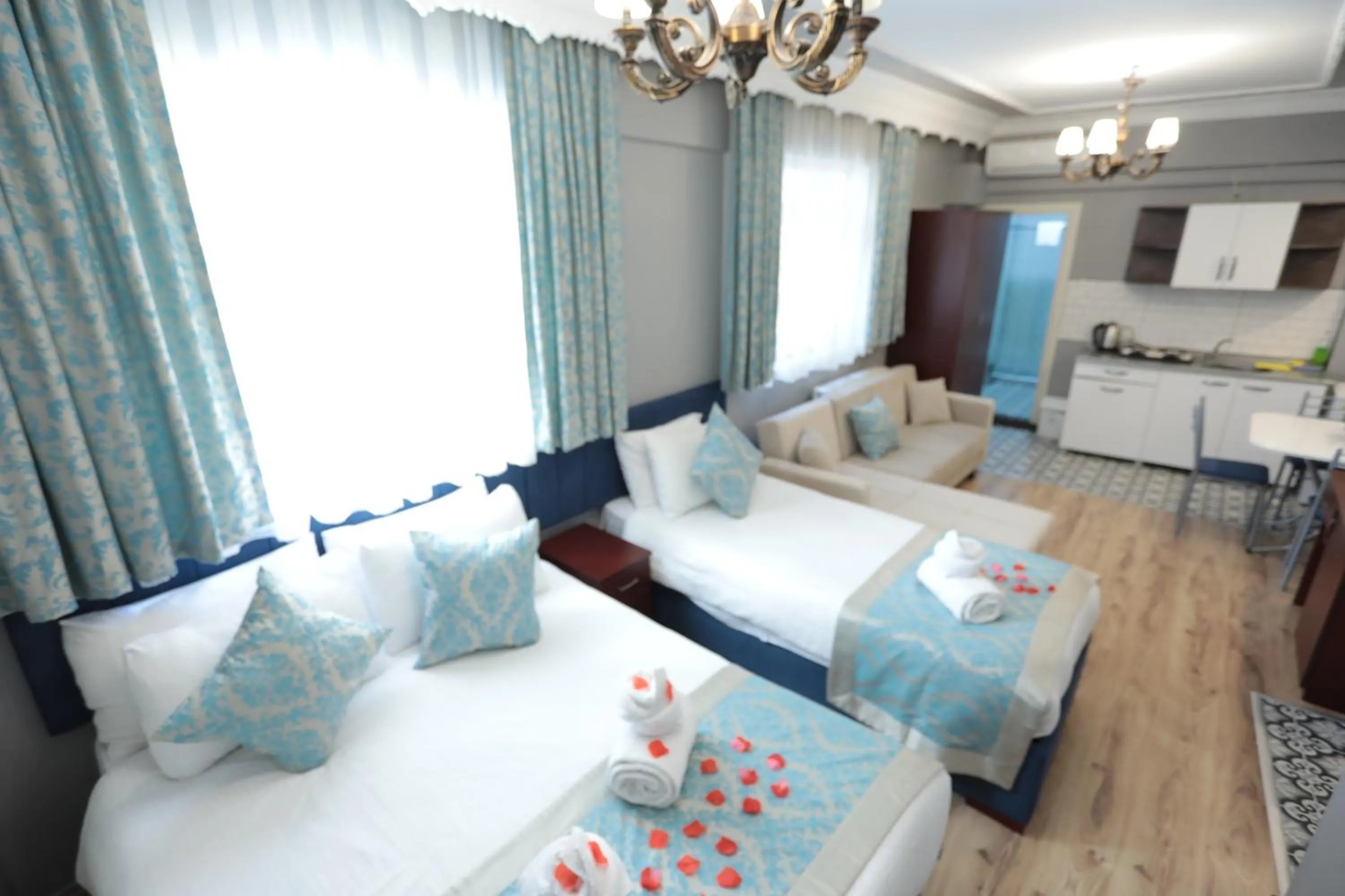 Bed in White Pearl Apart Hotel