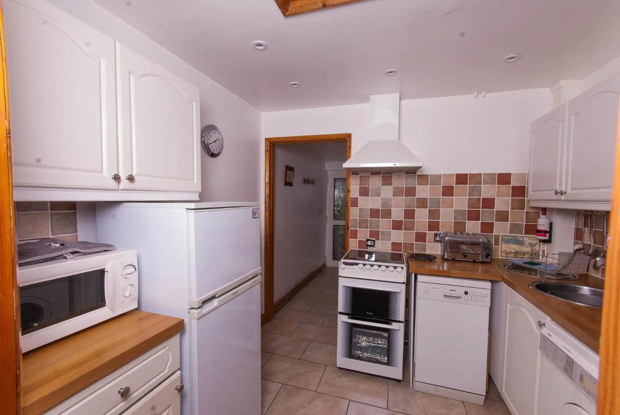 Kitchen or kitchenette in Greyfield Farm Cottages