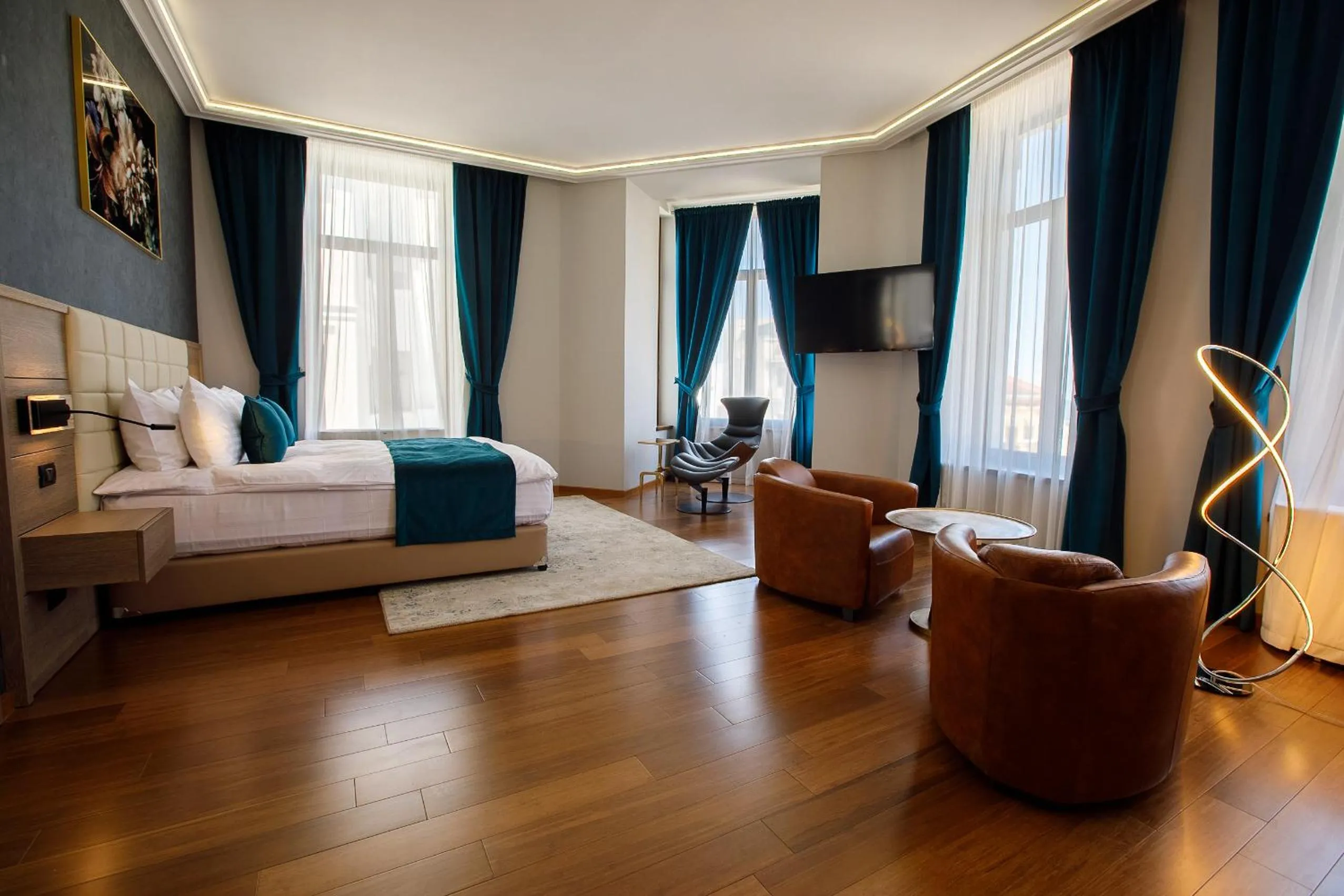 Seating area, Bed in Casa Hrisicos