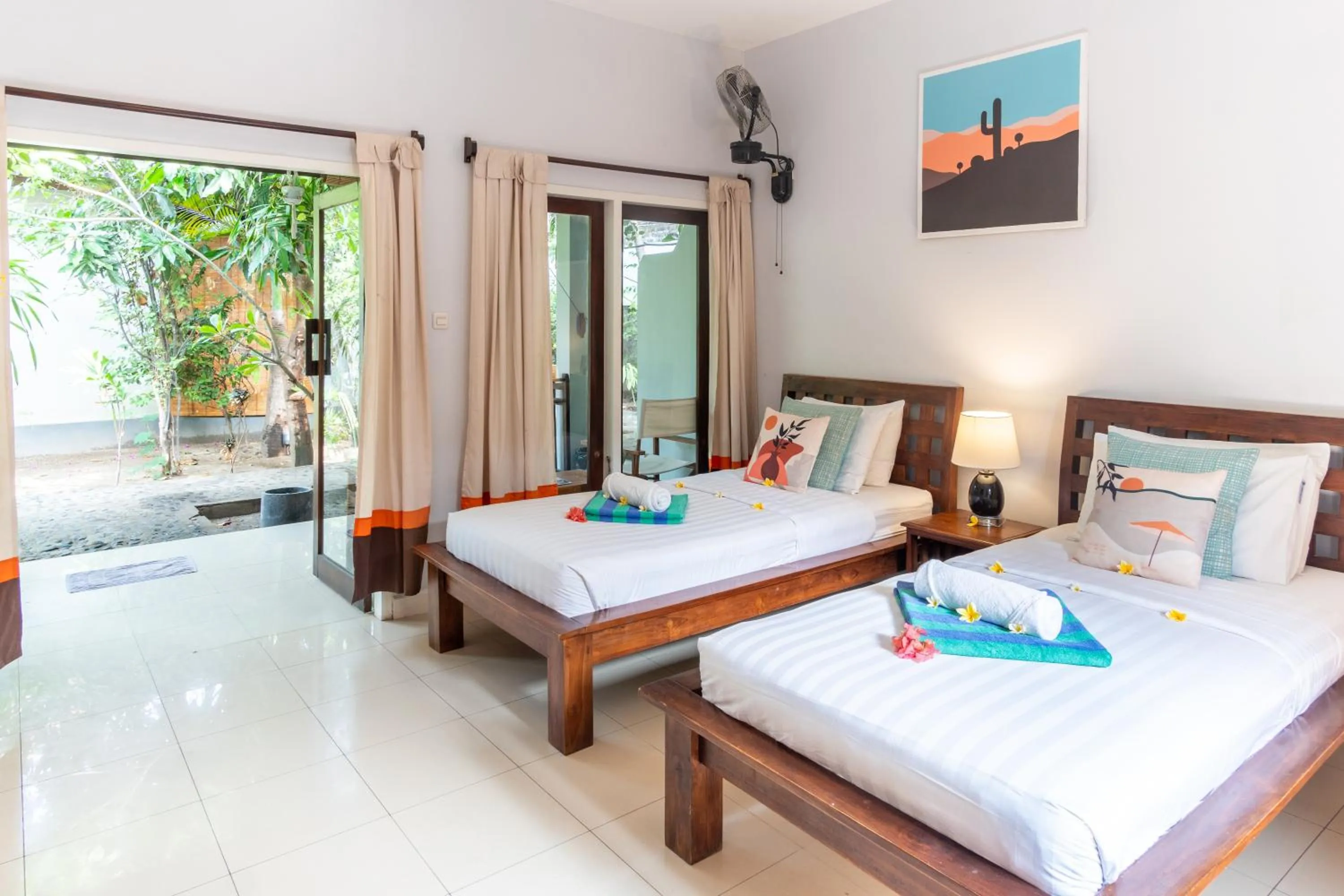 Bed in Bale Sampan Boutique Bungalows