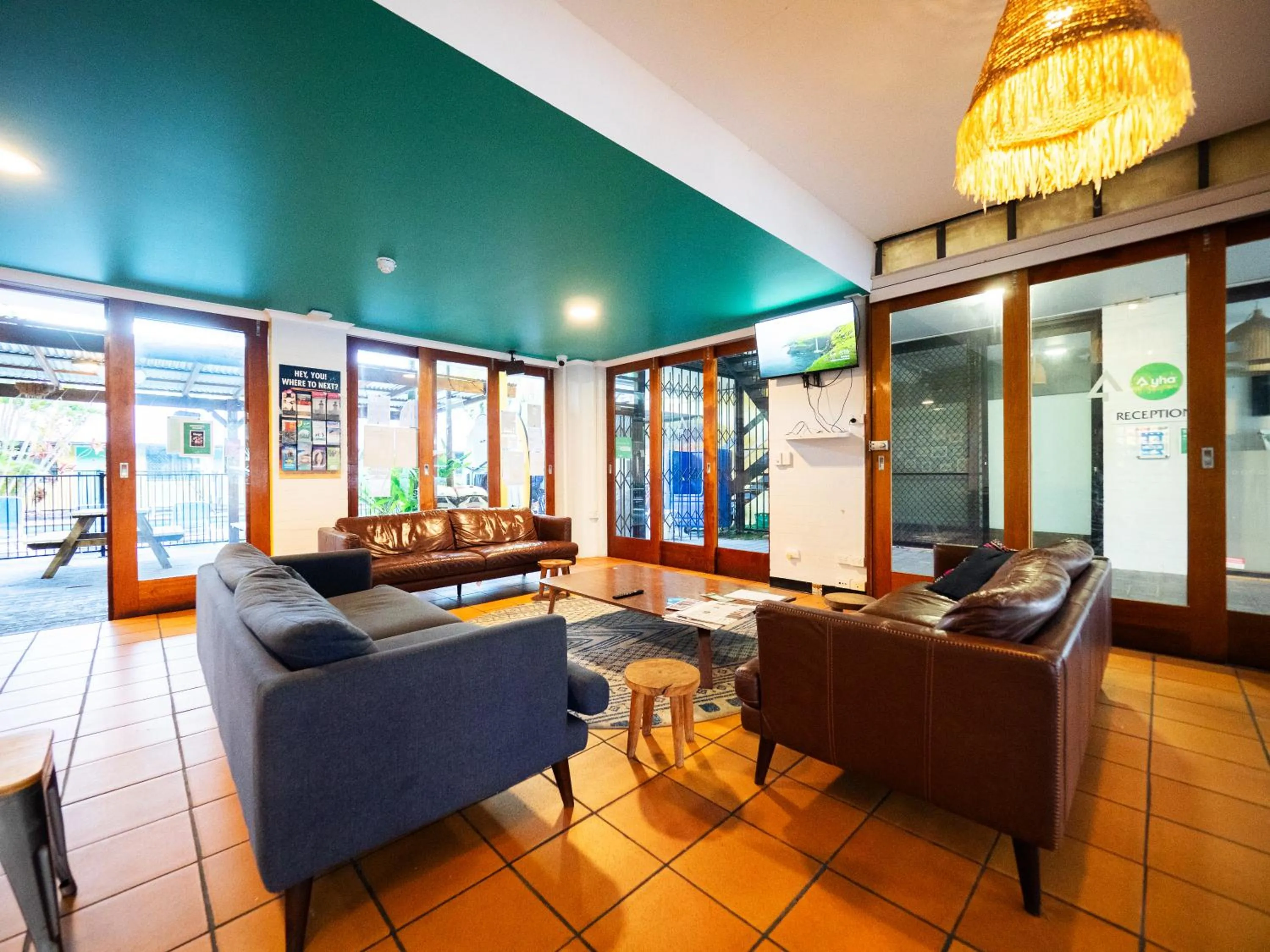 Communal lounge/ TV room in YHA Cape Byron, Byron Bay