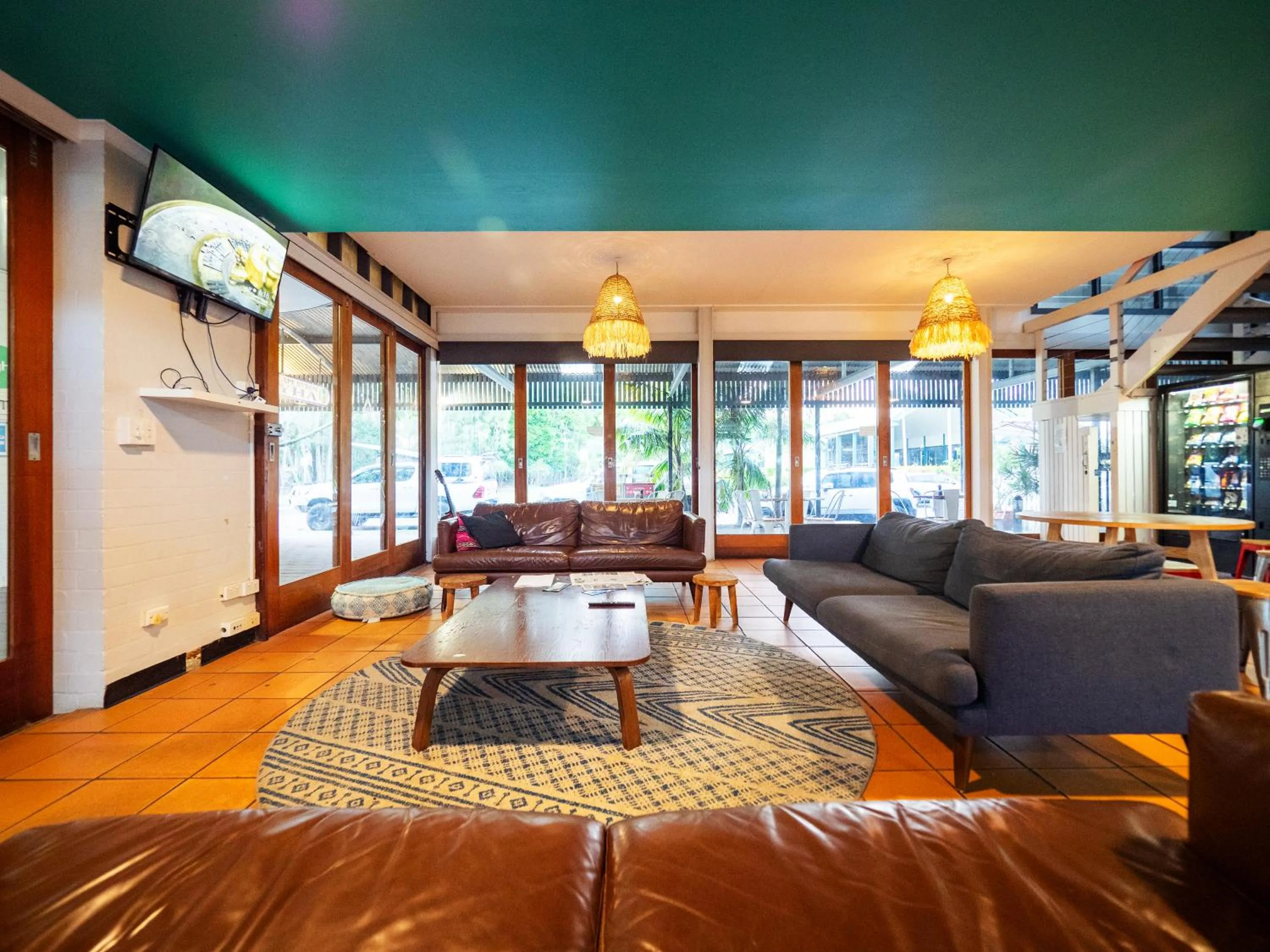 Communal lounge/ TV room in YHA Cape Byron, Byron Bay