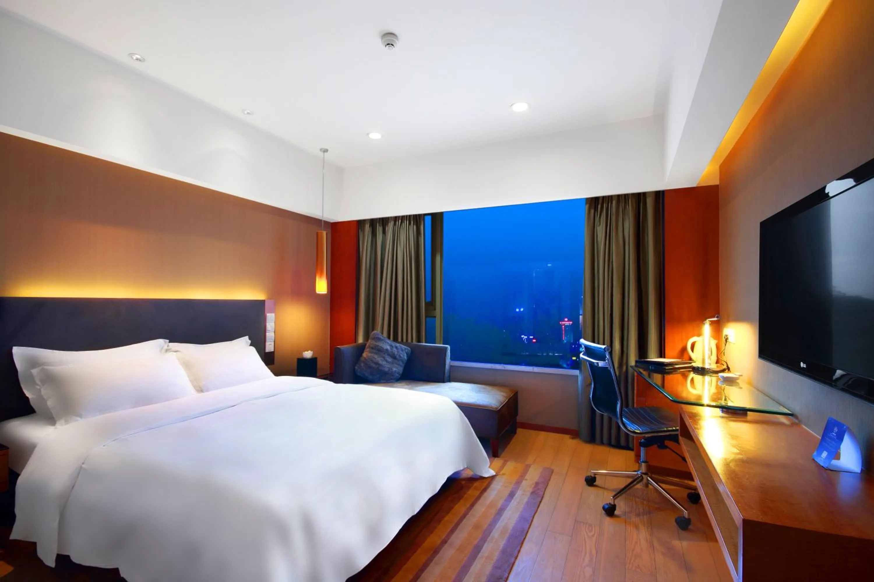Bed in Grand Mercure Dongguan Humen