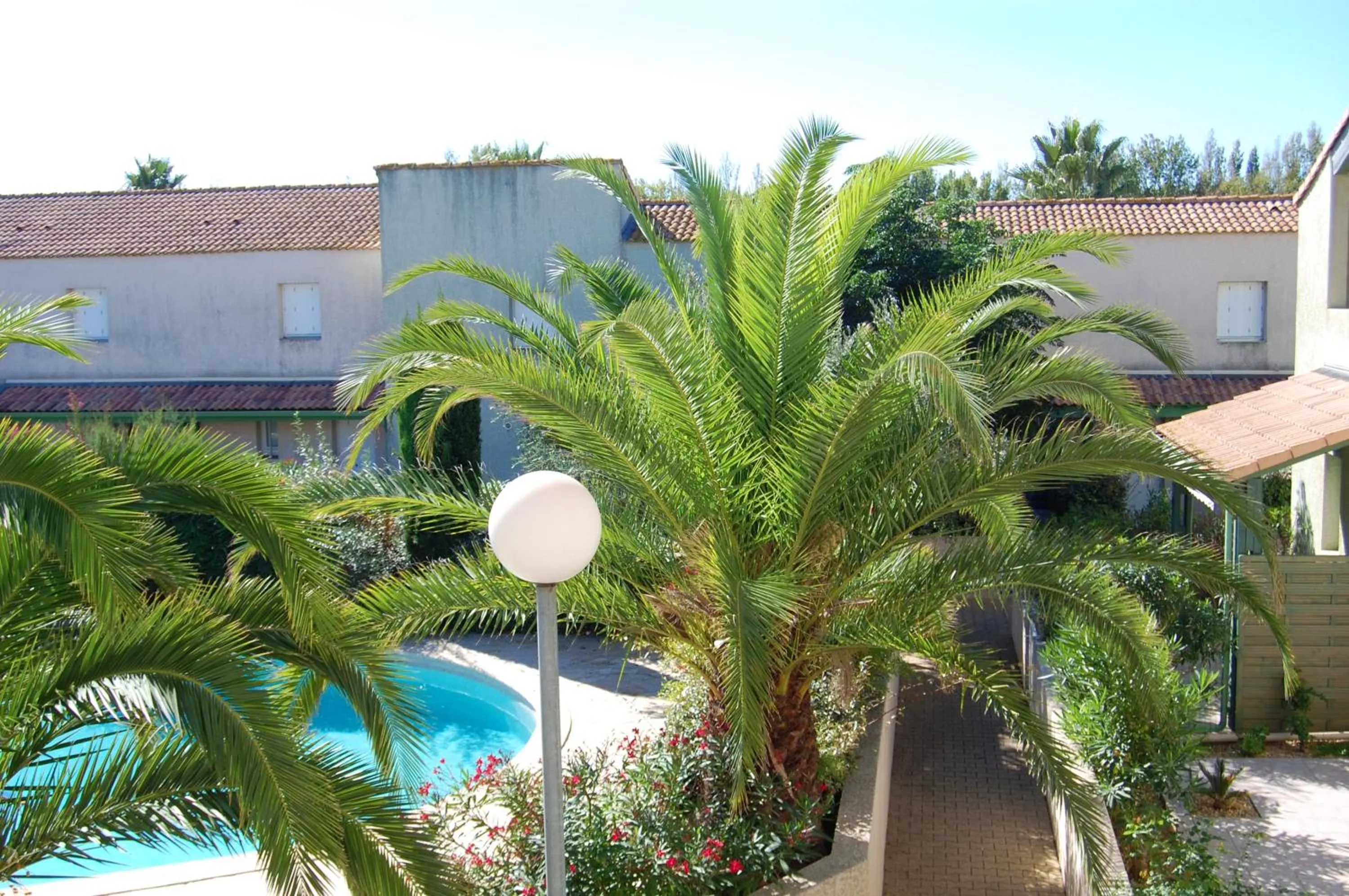 Pool view in Appartement cosy à Valras-Plage / 48m² / Piscine partagée