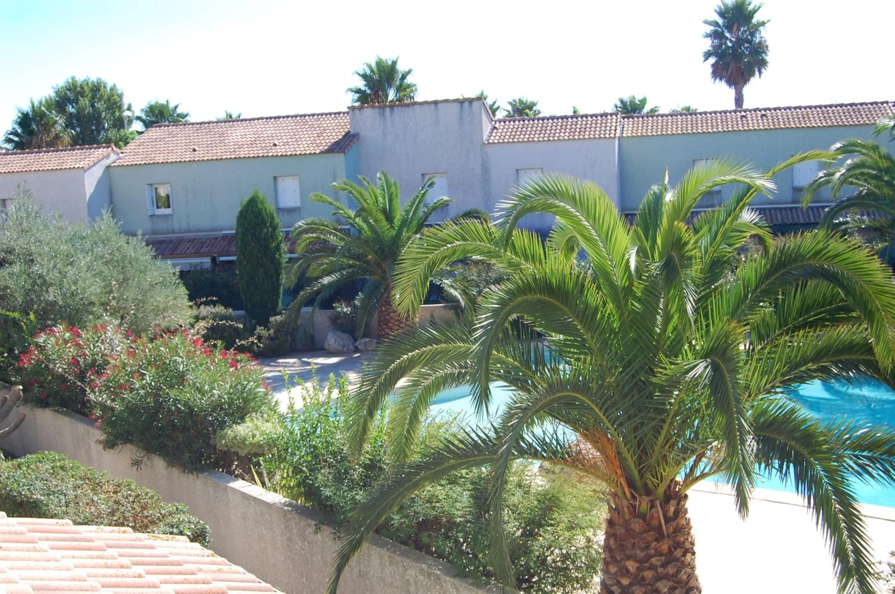 Garden view in Appartement cosy à Valras-Plage / 48m² / Piscine partagée