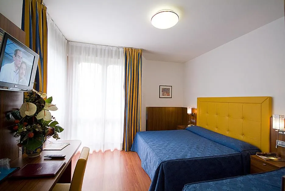 Bed in Hotel Ariston