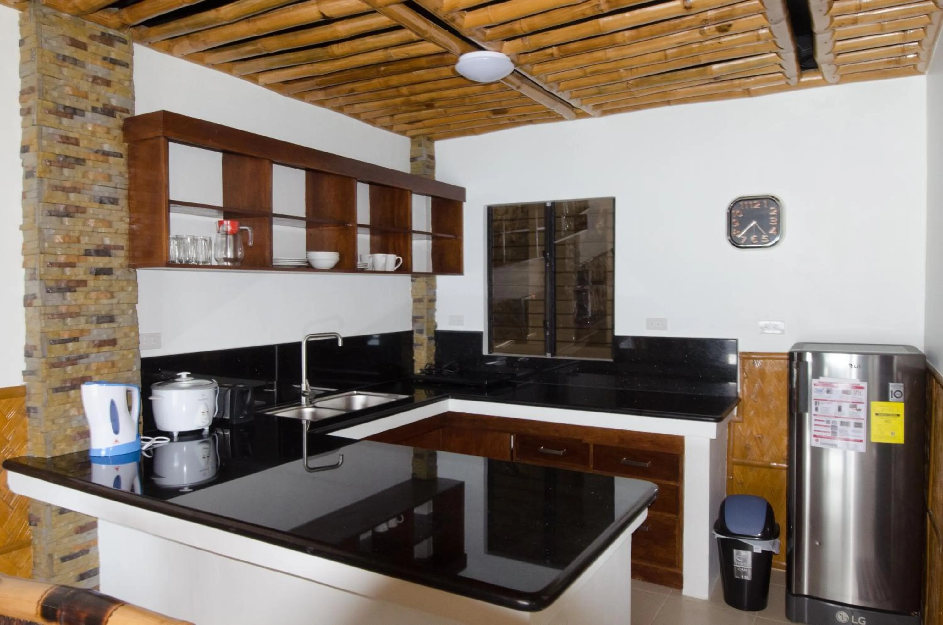 Kitchen or kitchenette in Villa de Pico Highland Beach Resort