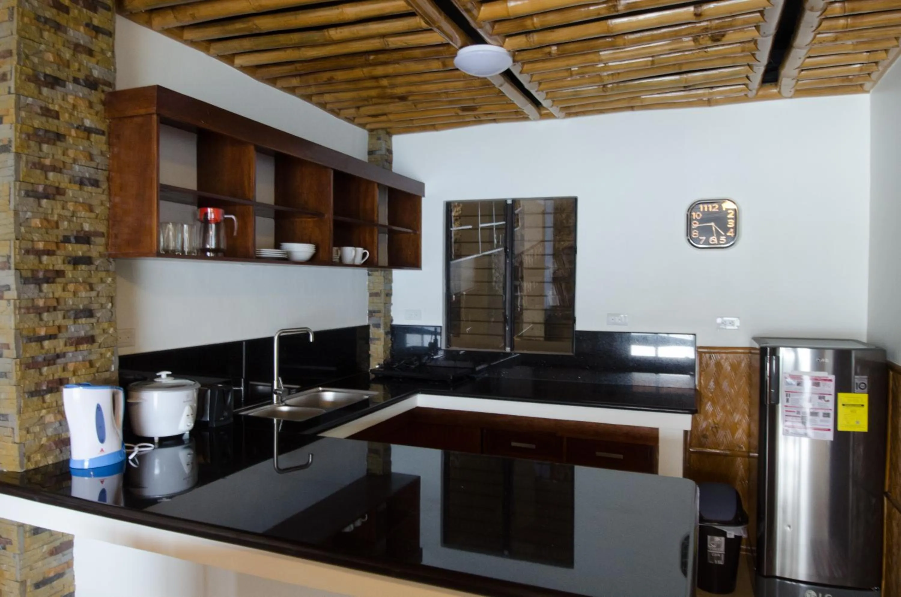 Kitchen or kitchenette in Villa de Pico Highland Beach Resort