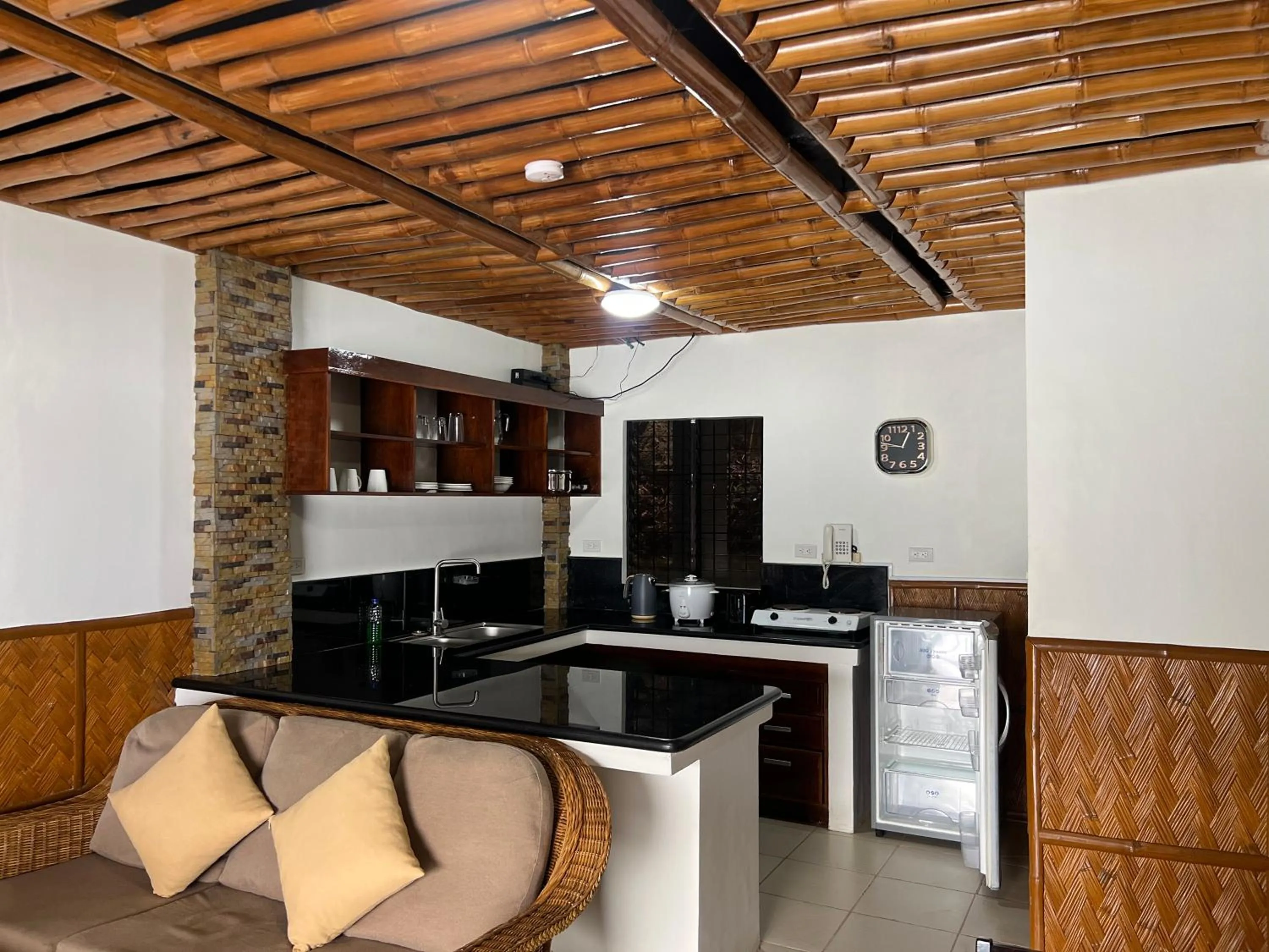 Kitchen or kitchenette in Villa de Pico Highland Beach Resort