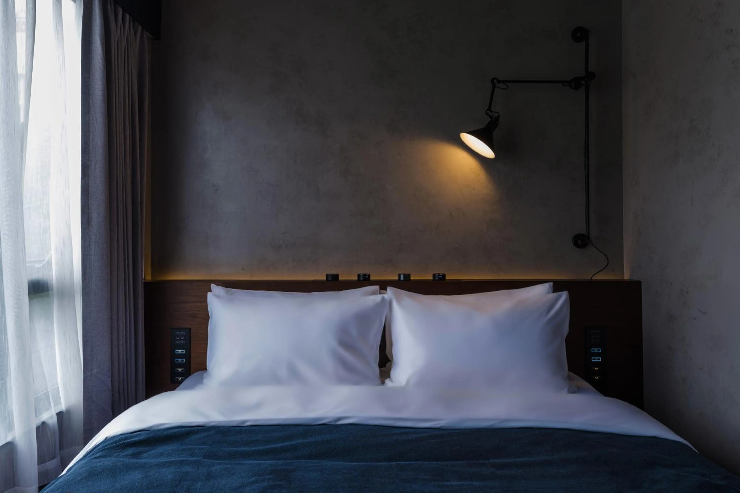 Bed in Neobridge Hotel