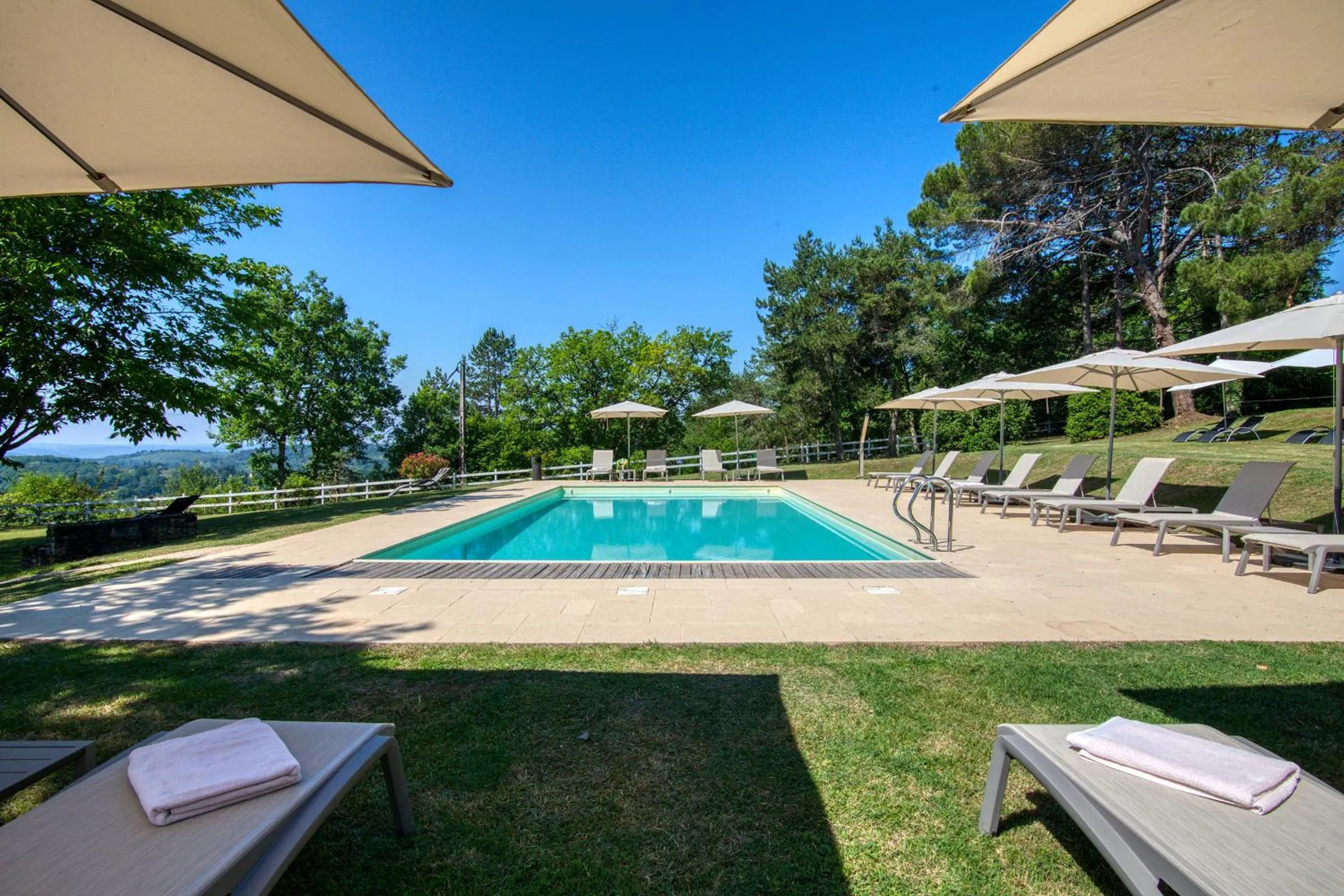 Swimming pool in Hôtel & restaurant Le Meysset