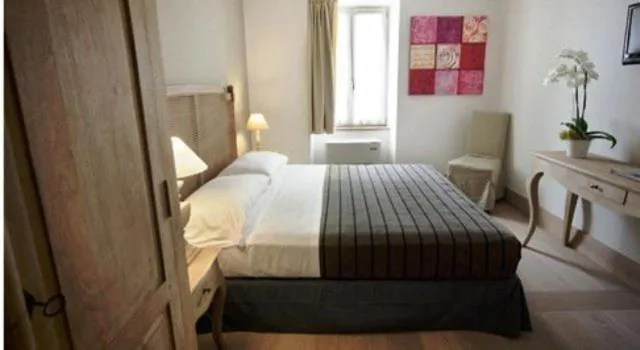 Bed in Locanda In Borgo Garnì & Wellness