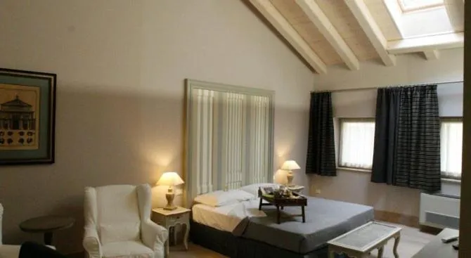 Bed in Locanda In Borgo Garnì & Wellness