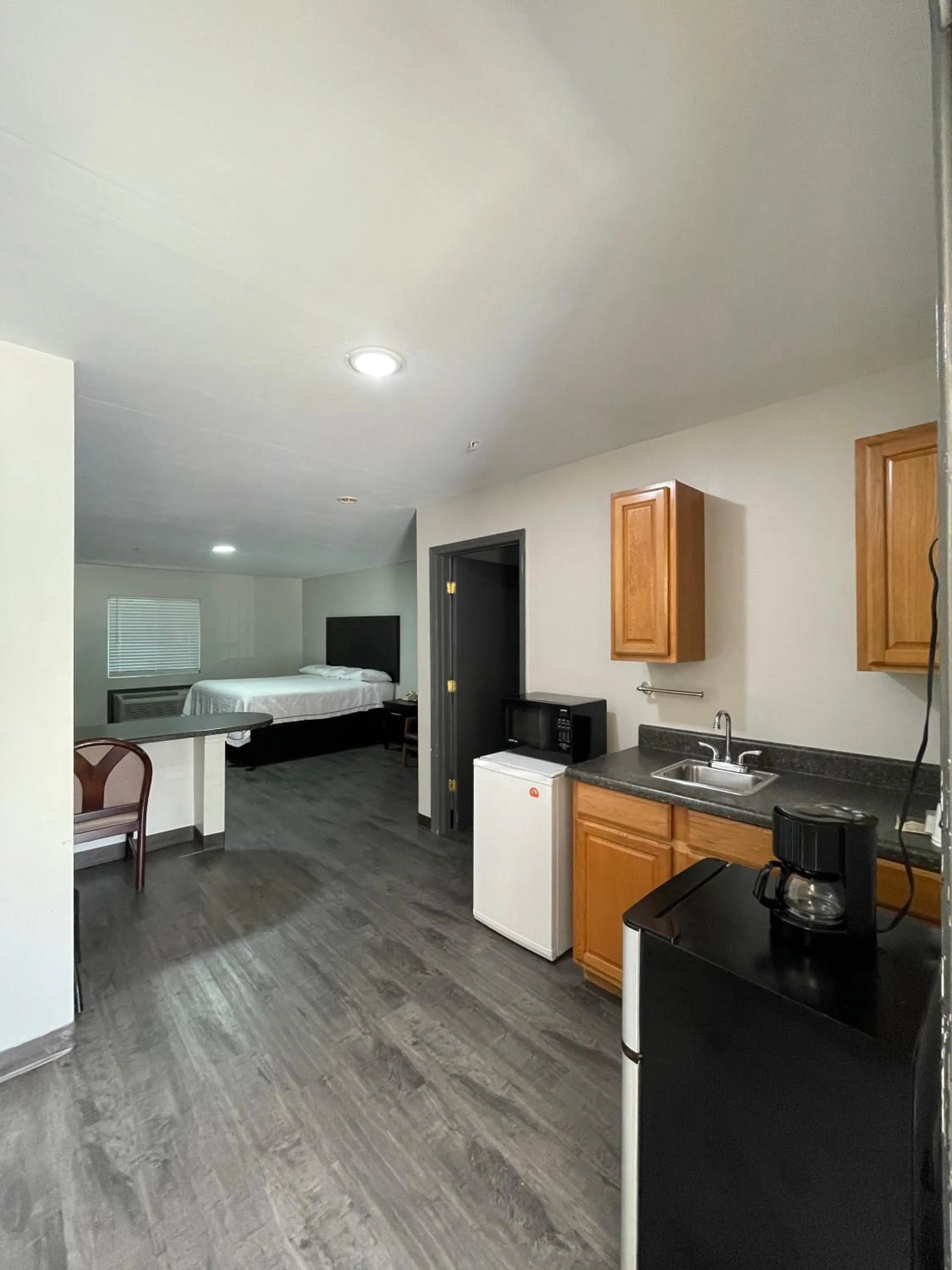 Bed in High Falls Inn & Suites