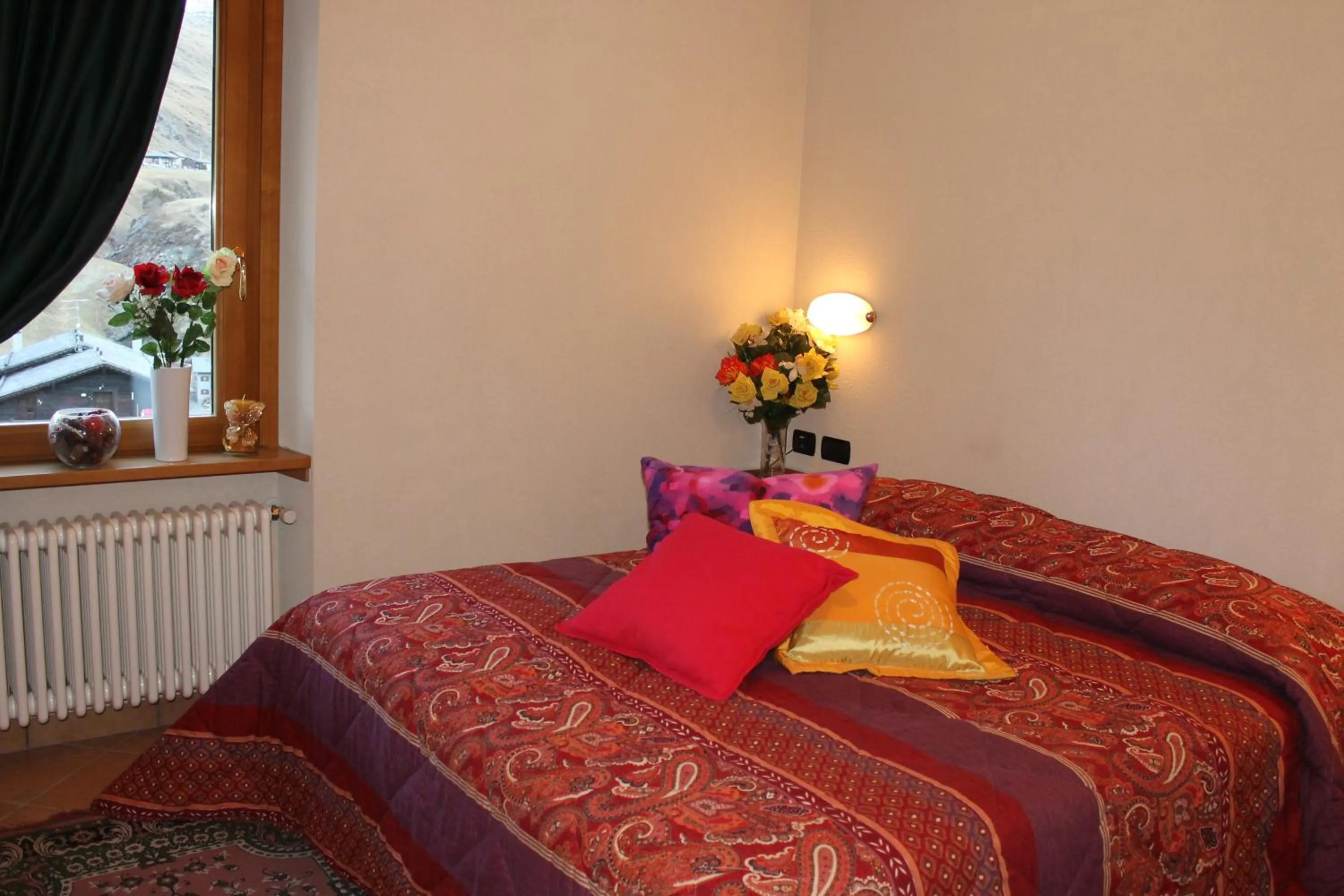 Bedroom in Hotel La Colombina