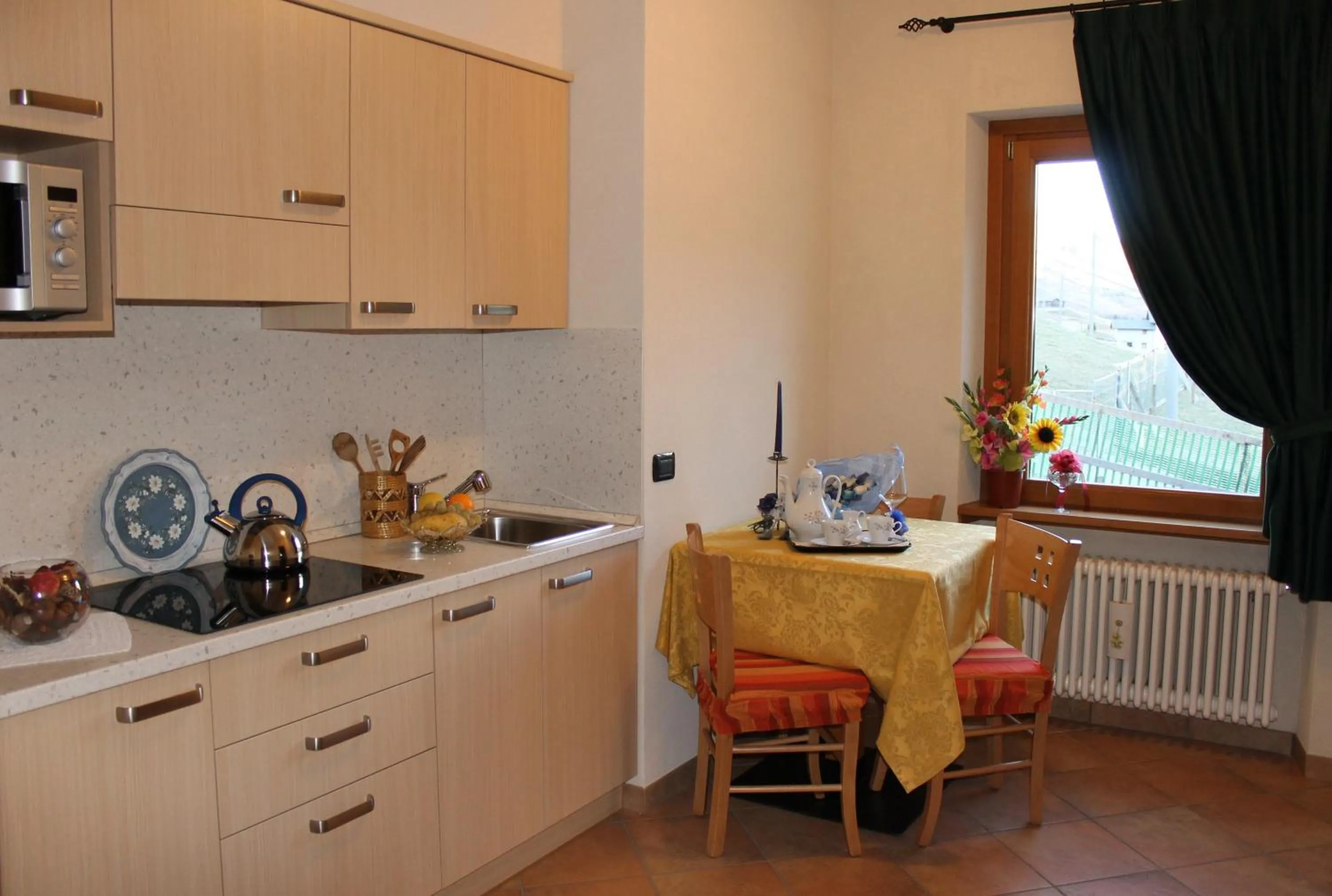 Kitchen or kitchenette in Hotel La Colombina