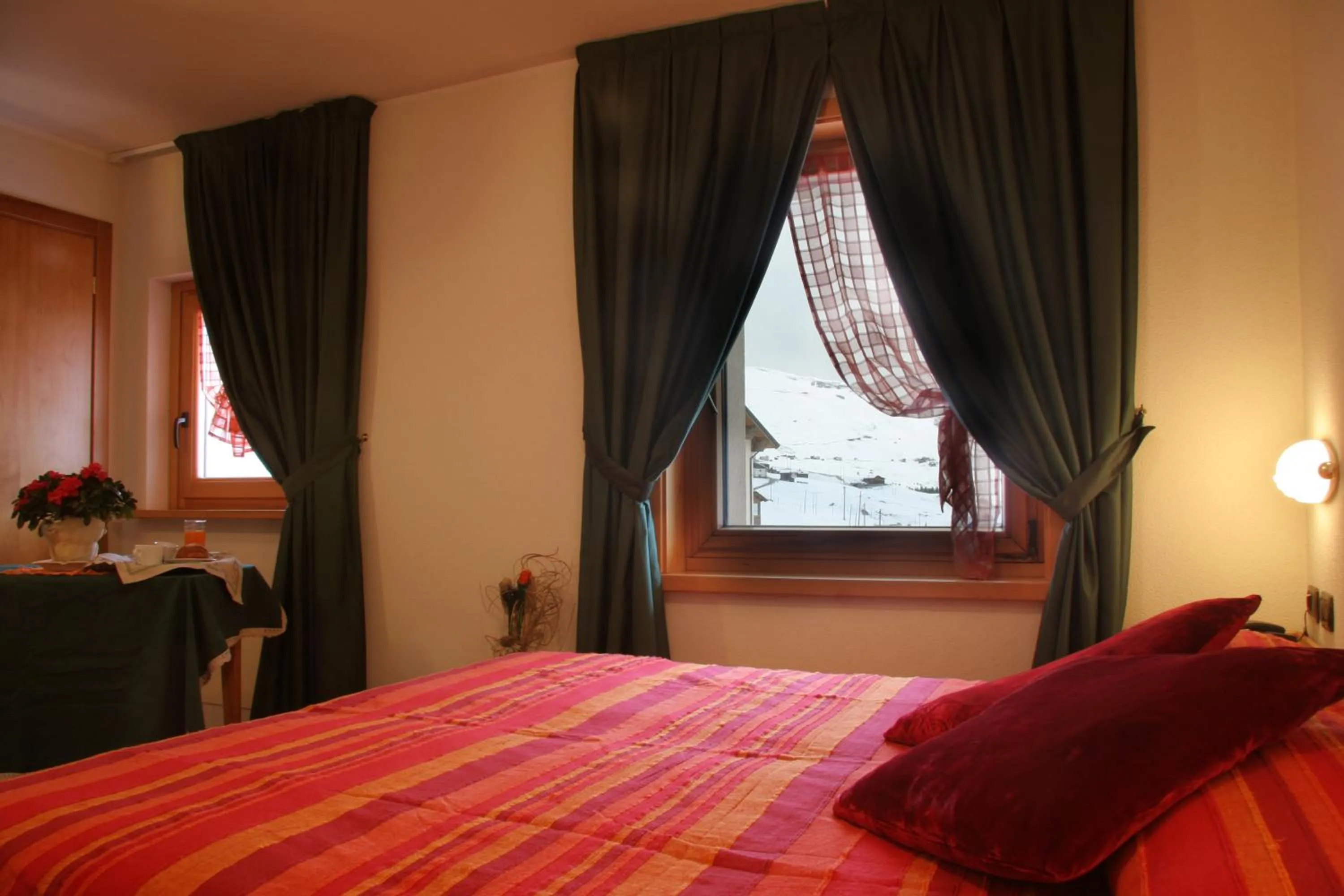 Bedroom in Hotel La Colombina