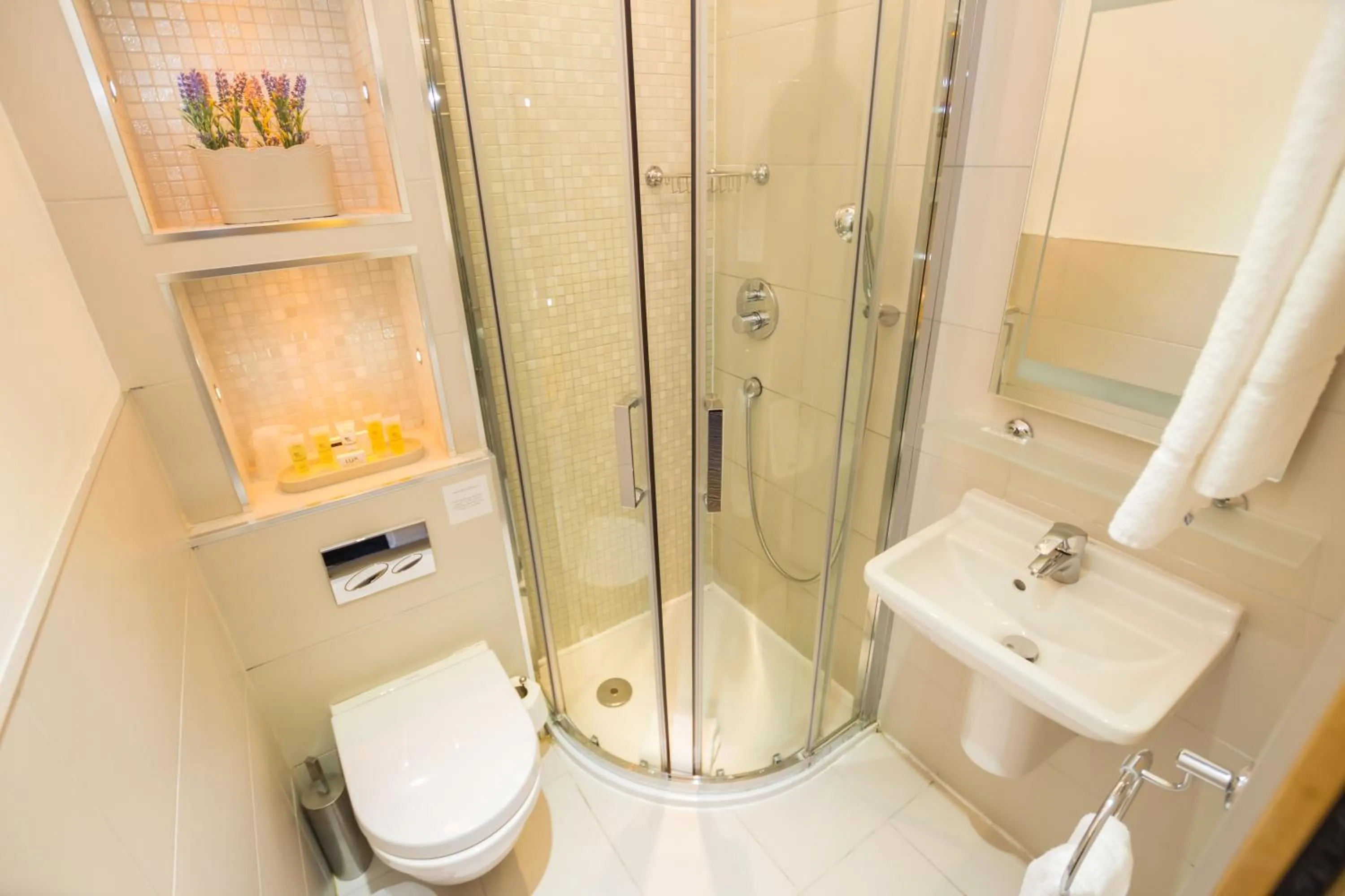 Bathroom in Arosfa Hotel London by Compass Hospitality