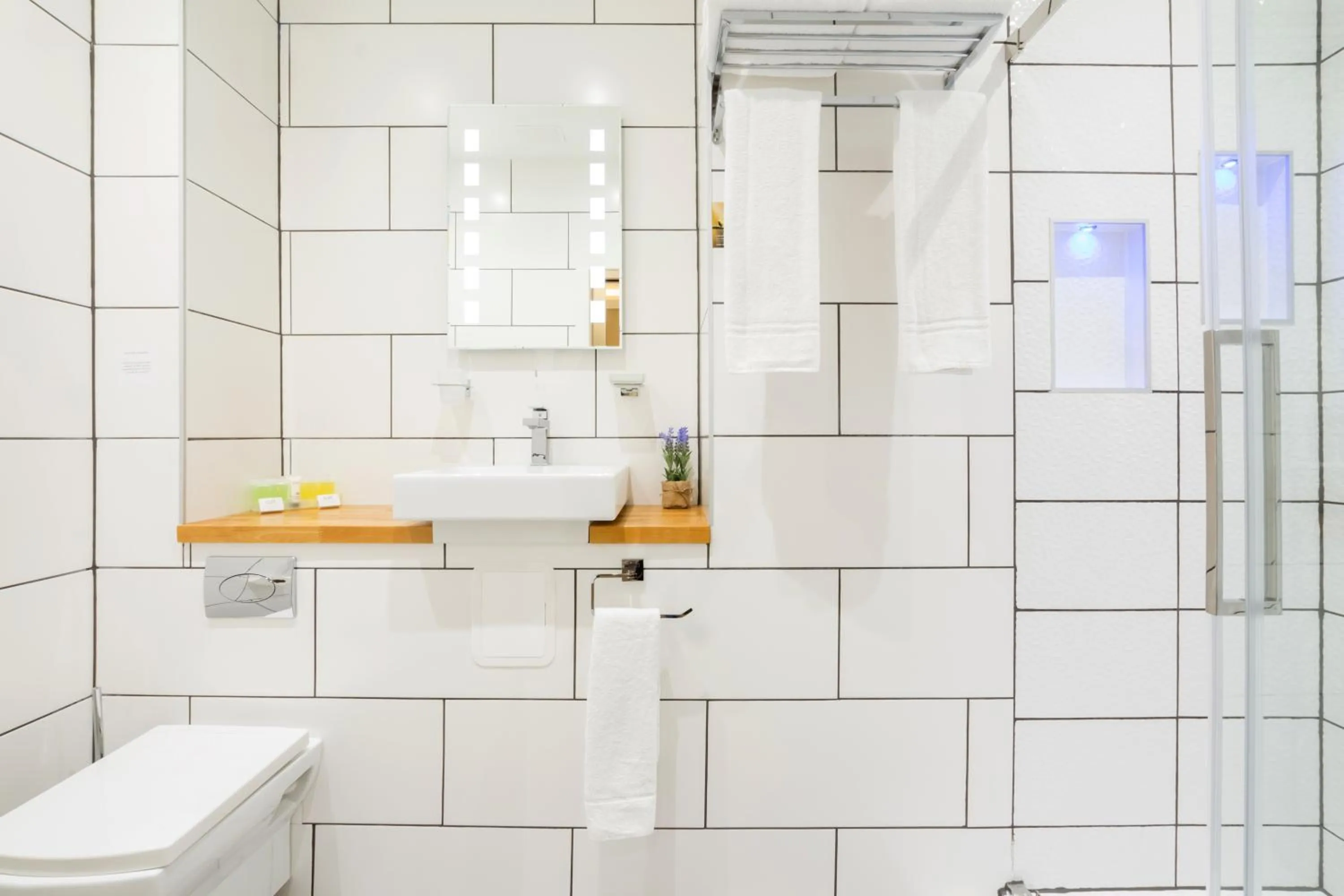 Bathroom in Arosfa Hotel London by Compass Hospitality