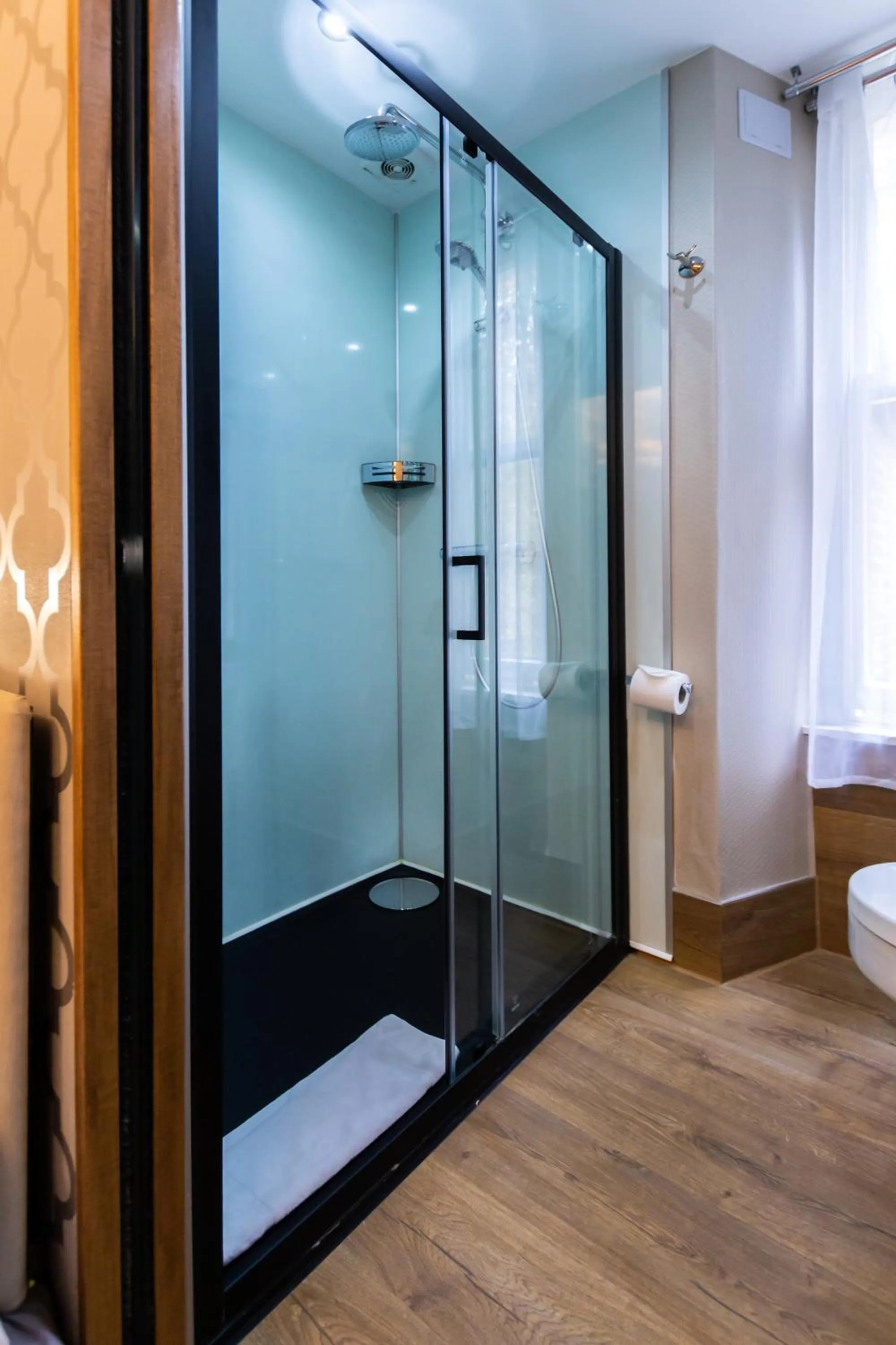 Bathroom in Arosfa Hotel London by Compass Hospitality