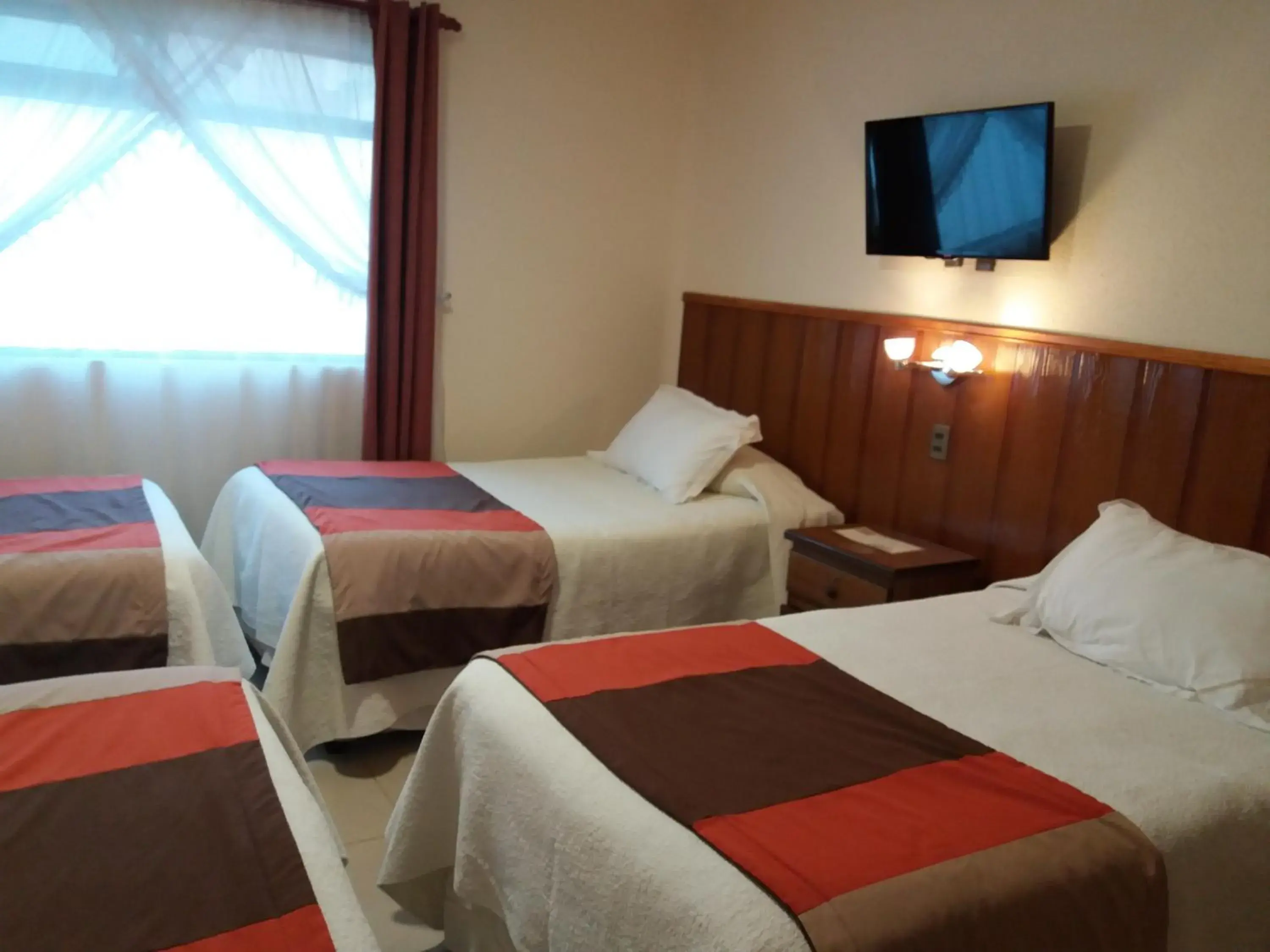 Premium Quadruple Room in Gran Hotel Ovalle Premium Quadruple Room in Gran Hotel Ovalle