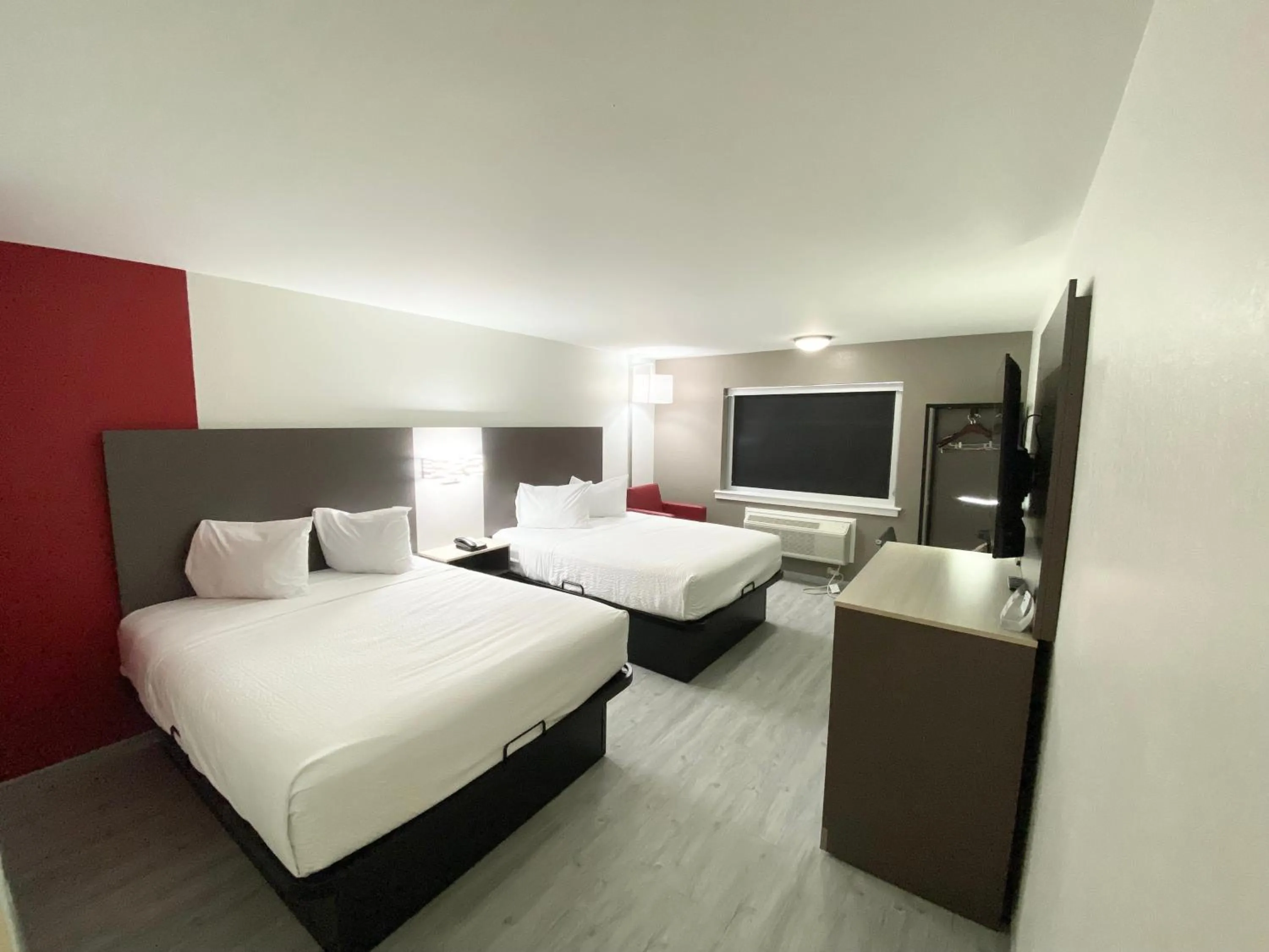 Bed in Ramada by Wyndham Tuscaloosa