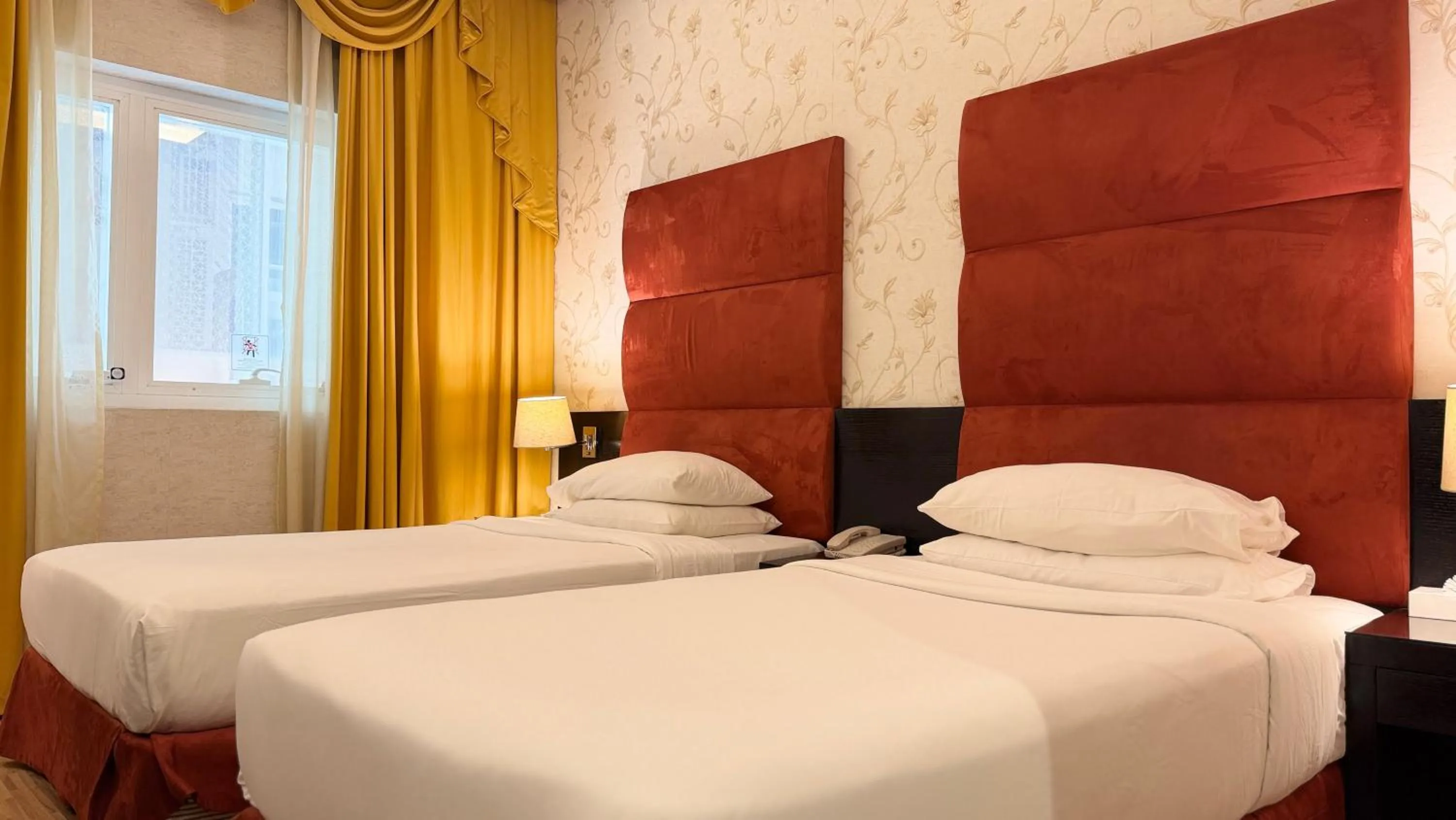 Bed in Sunday Mangrove Corniche Hotel, Ras Al Khaimah