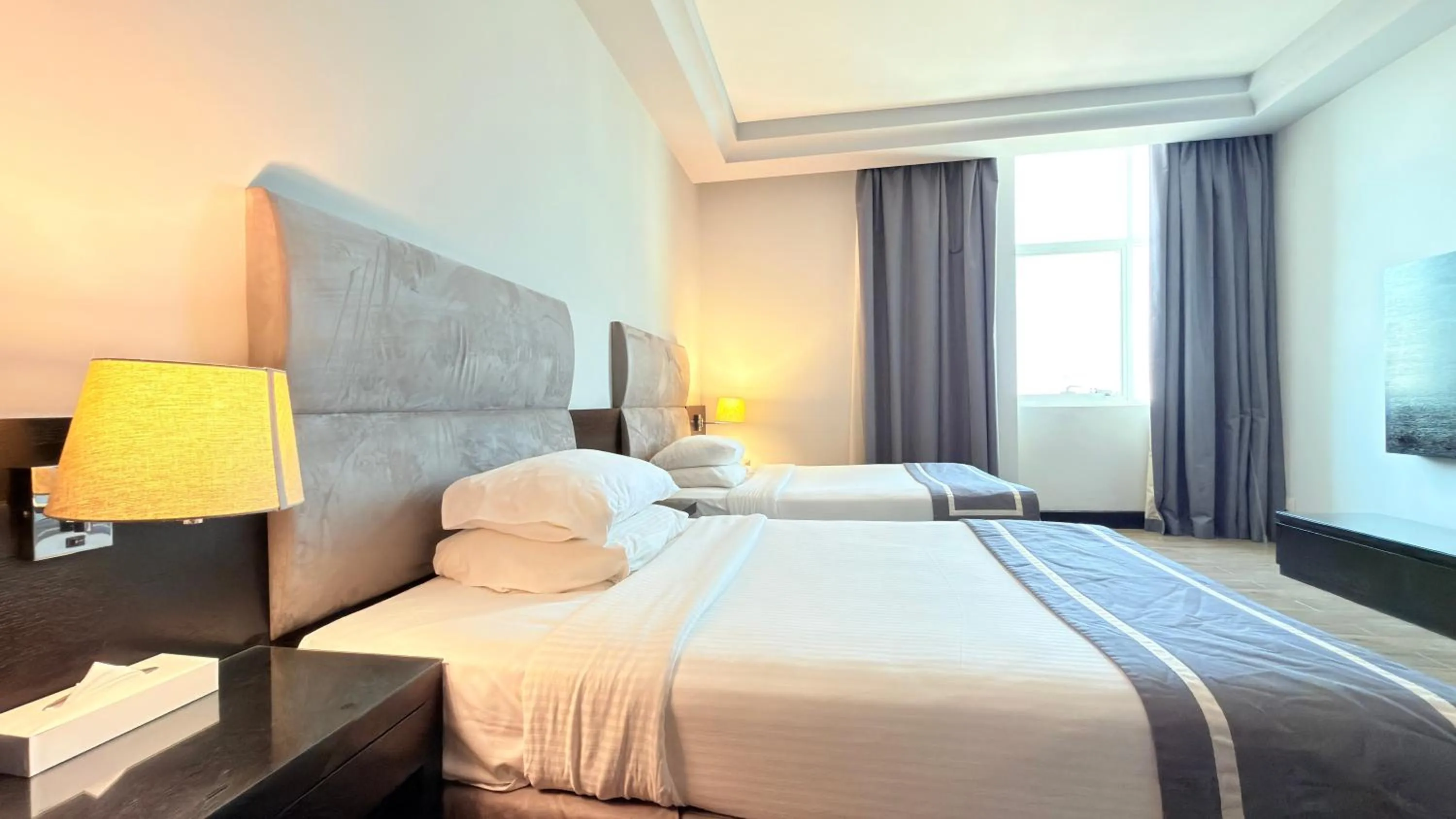 Bed in Sunday Mangrove Corniche Hotel, Ras Al Khaimah