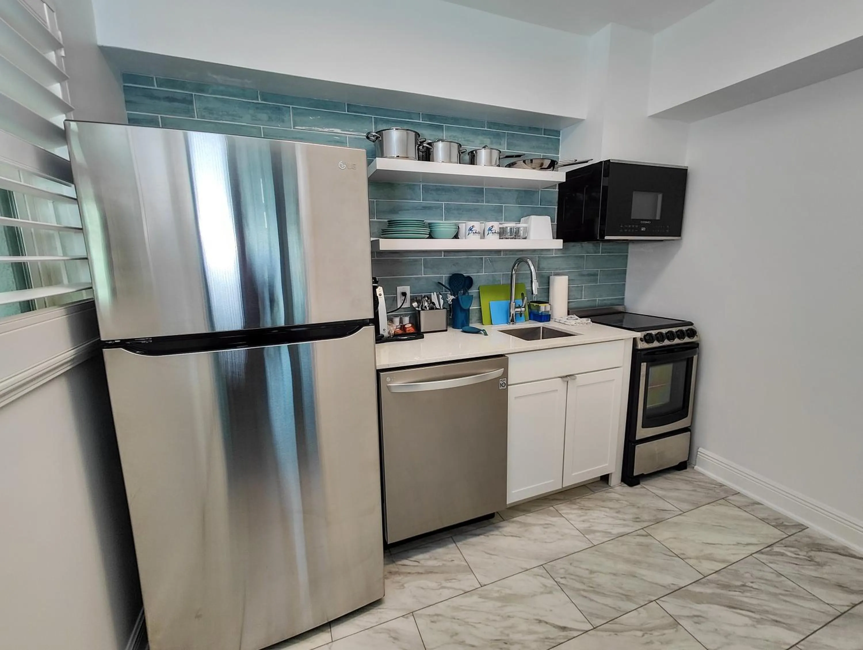 Kitchen or kitchenette in Tahitian Beach Resort