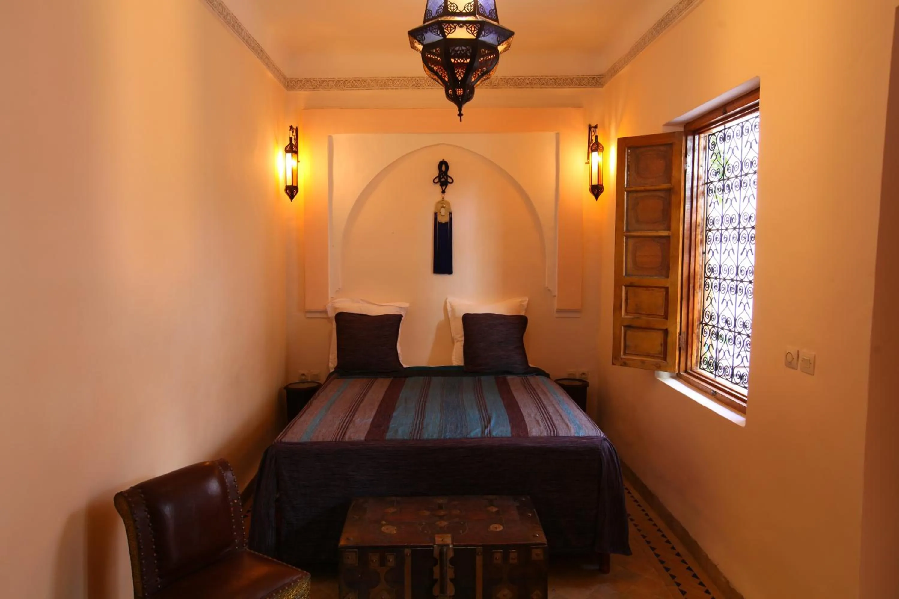 Bed in Riad Arbre Bleu