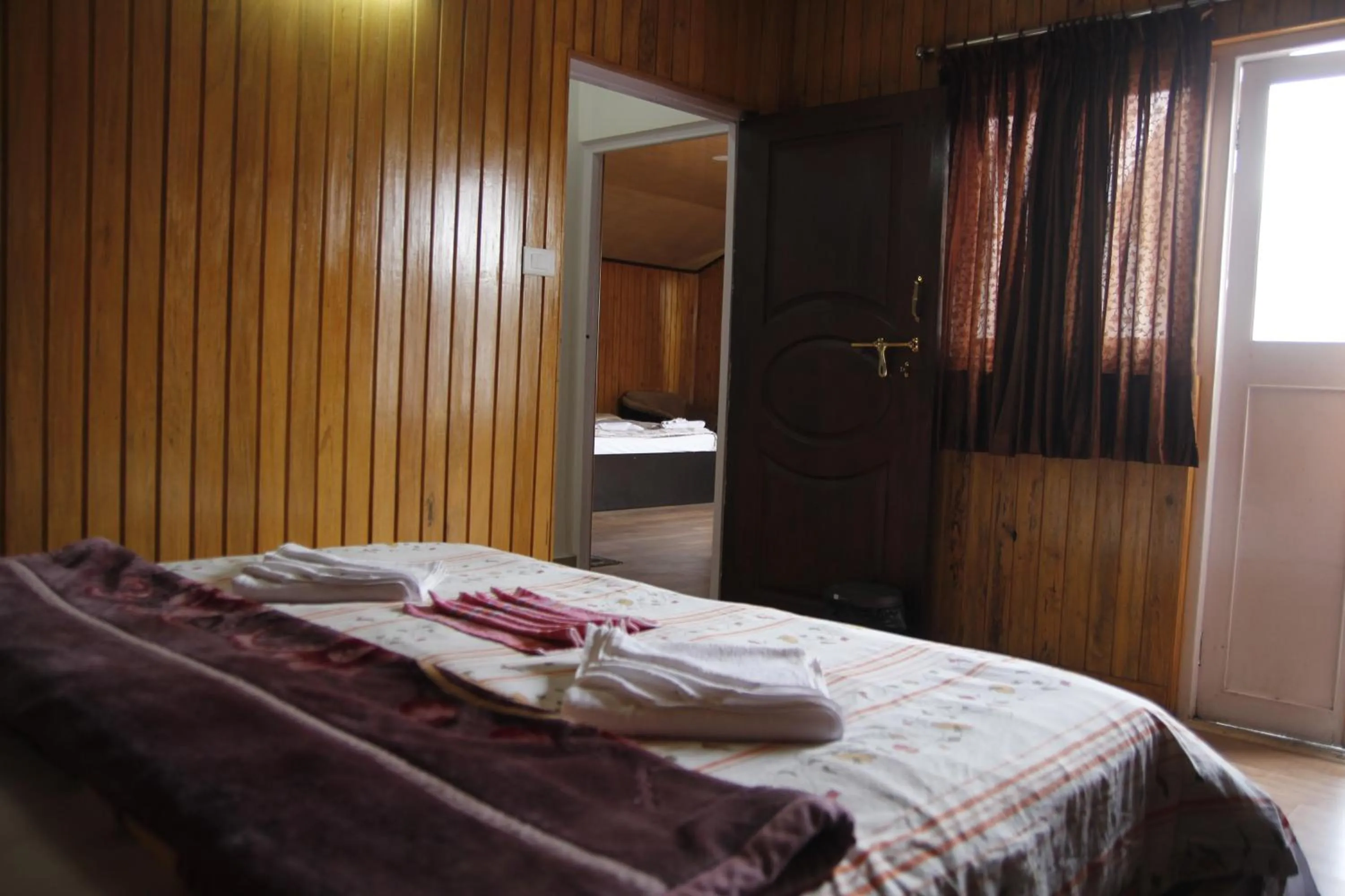 Bedroom, Bed in Mandarin Resort - Kaluk