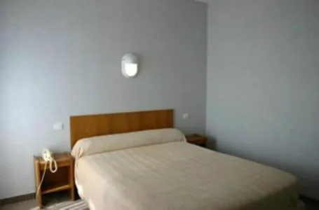 Photo of the whole room, Bed in Hôtel du Marché