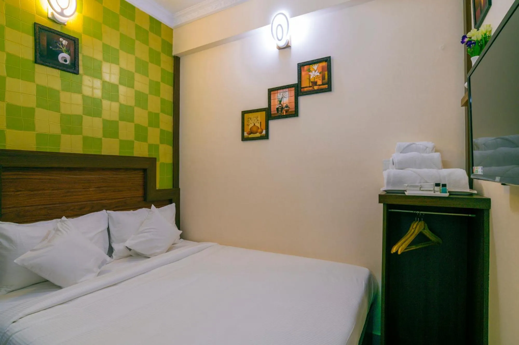 Bed in Blue Bell Cochin Airport Hotel